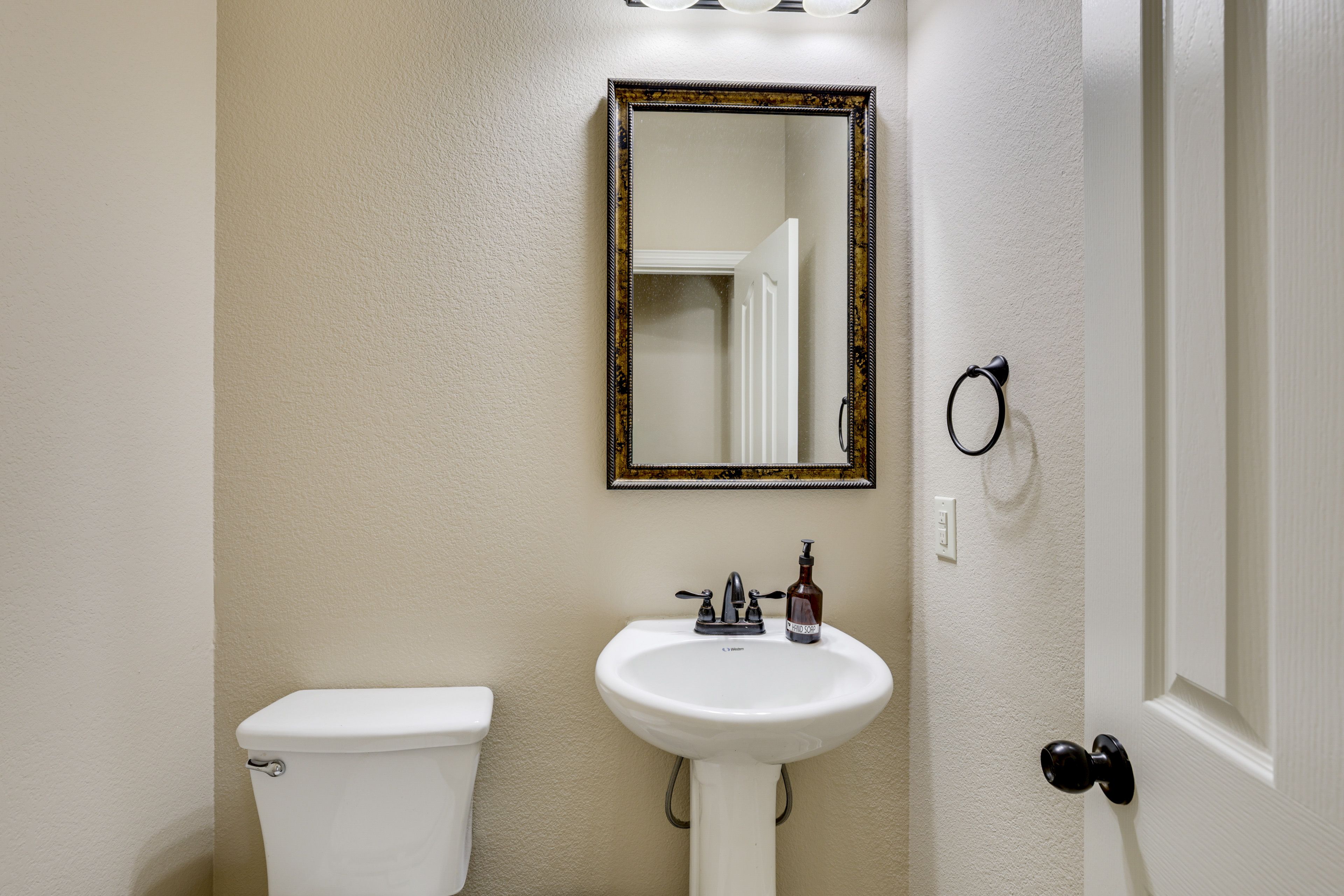 Half Bathroom | 1st Floor | Complimentary Toiletries | Towels Provided