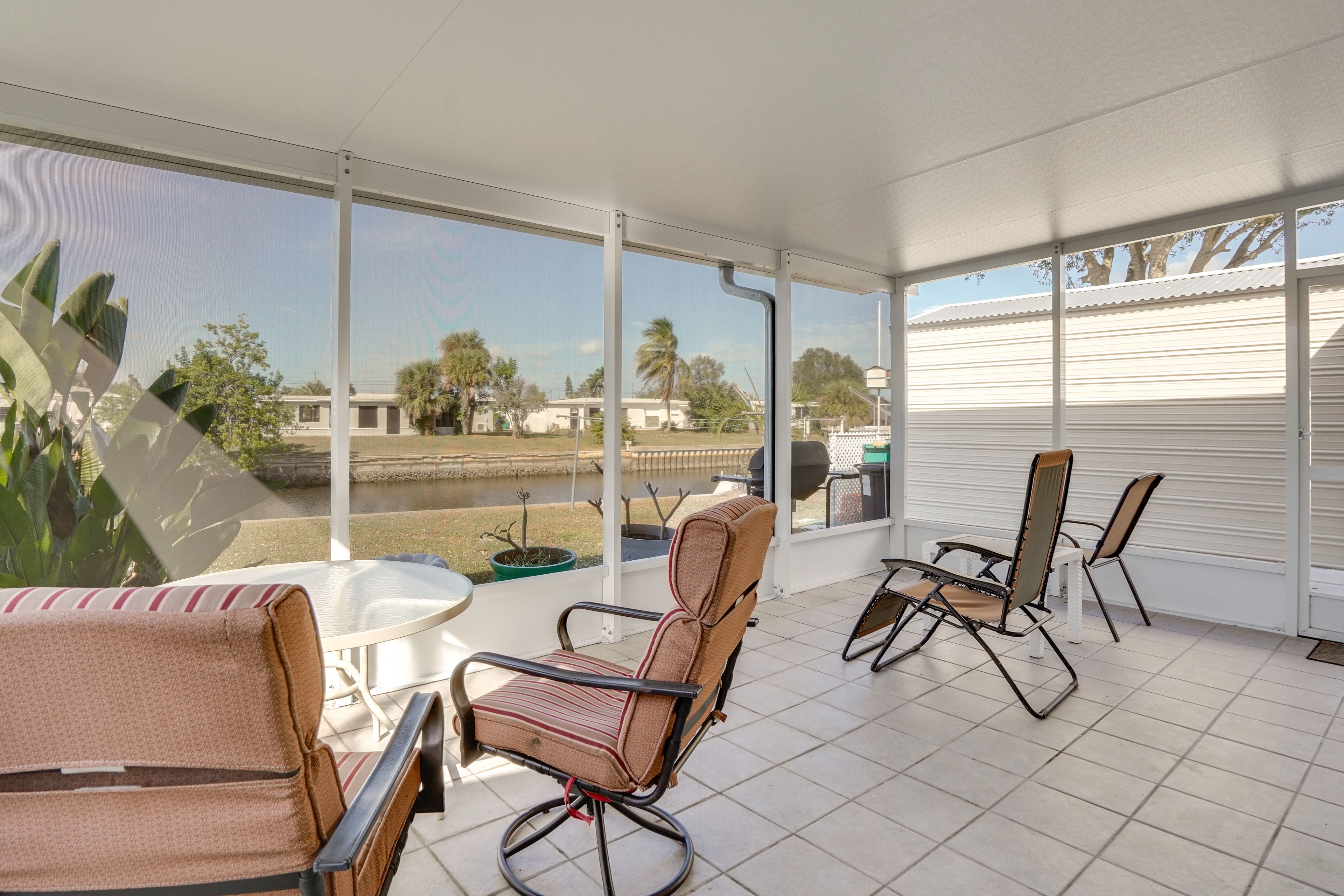 Screened Lanai | Outdoor Seating | Canal View