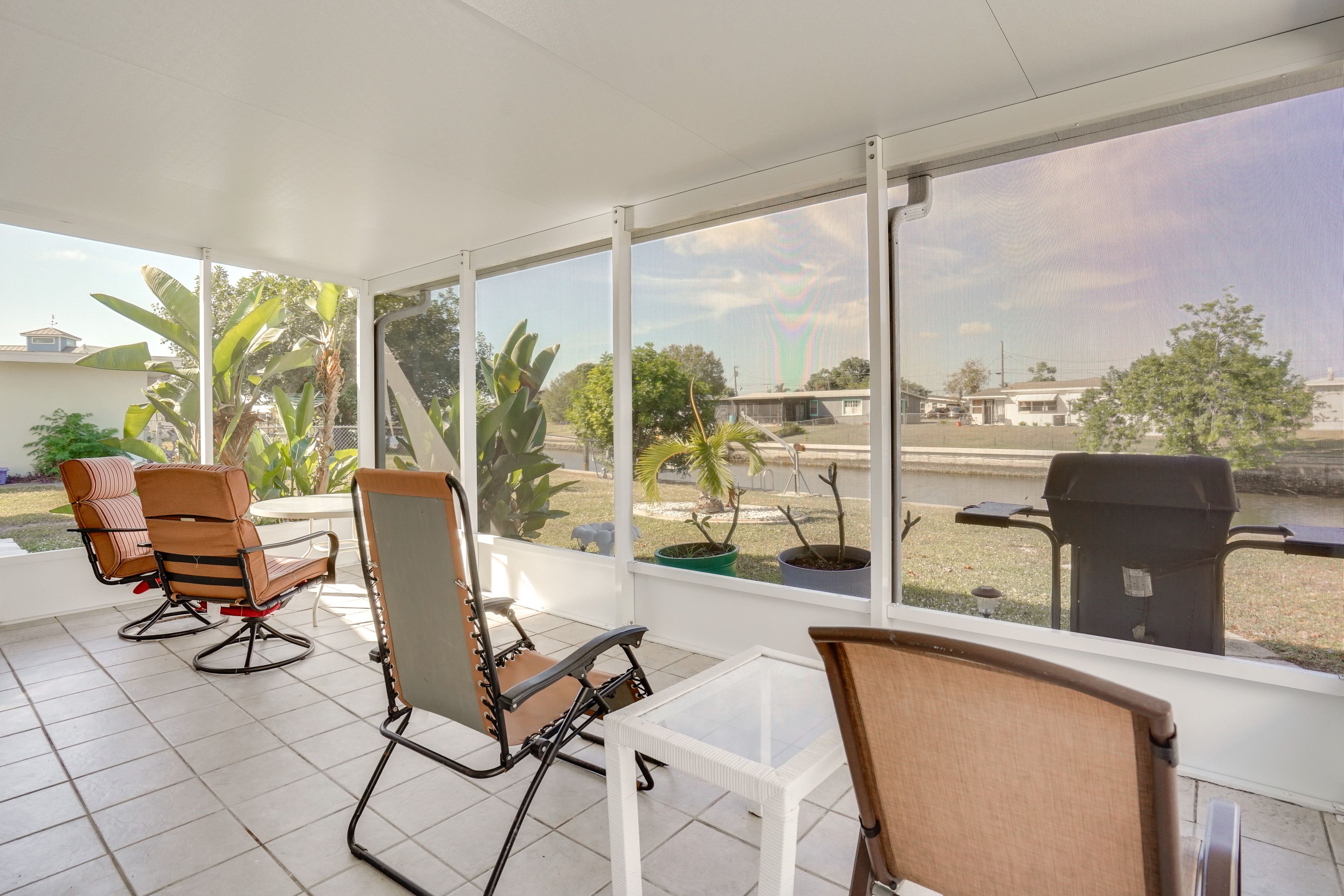 Screened Lanai | Outdoor Seating | Canal View