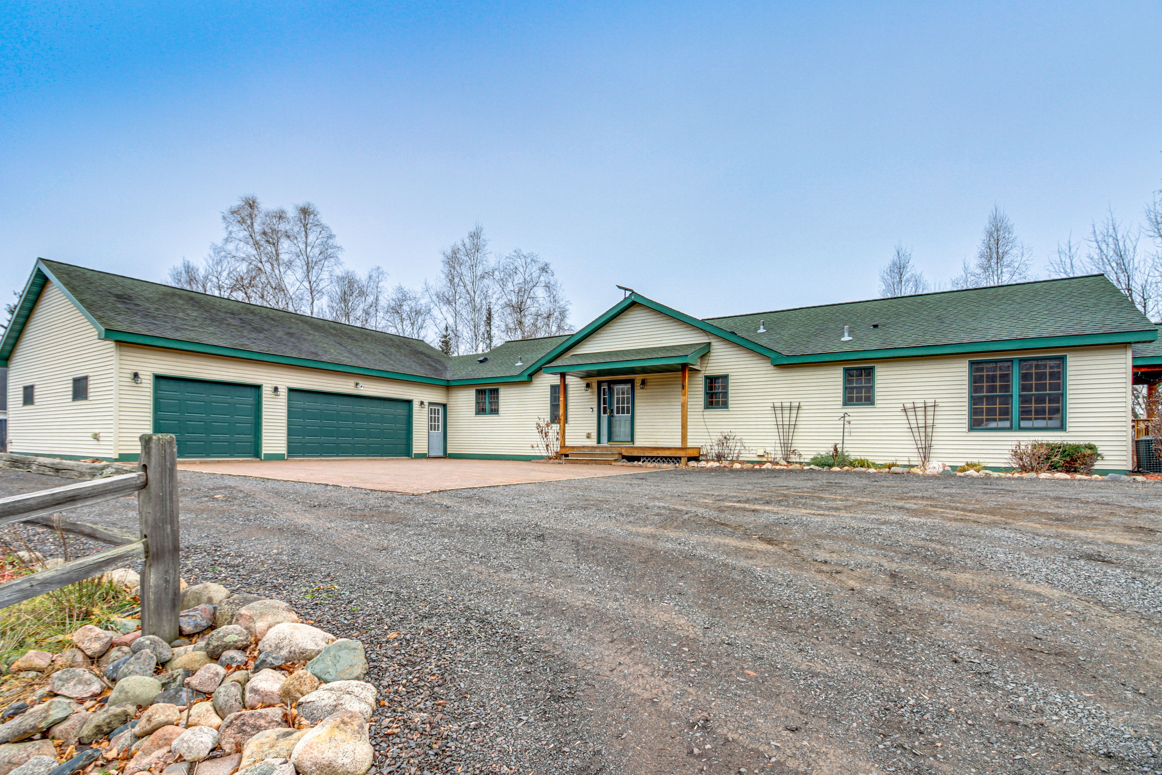 House Exterior | Driveway (5 Vehicles) | RV/Trailer/Snowmobile Parking Allowed