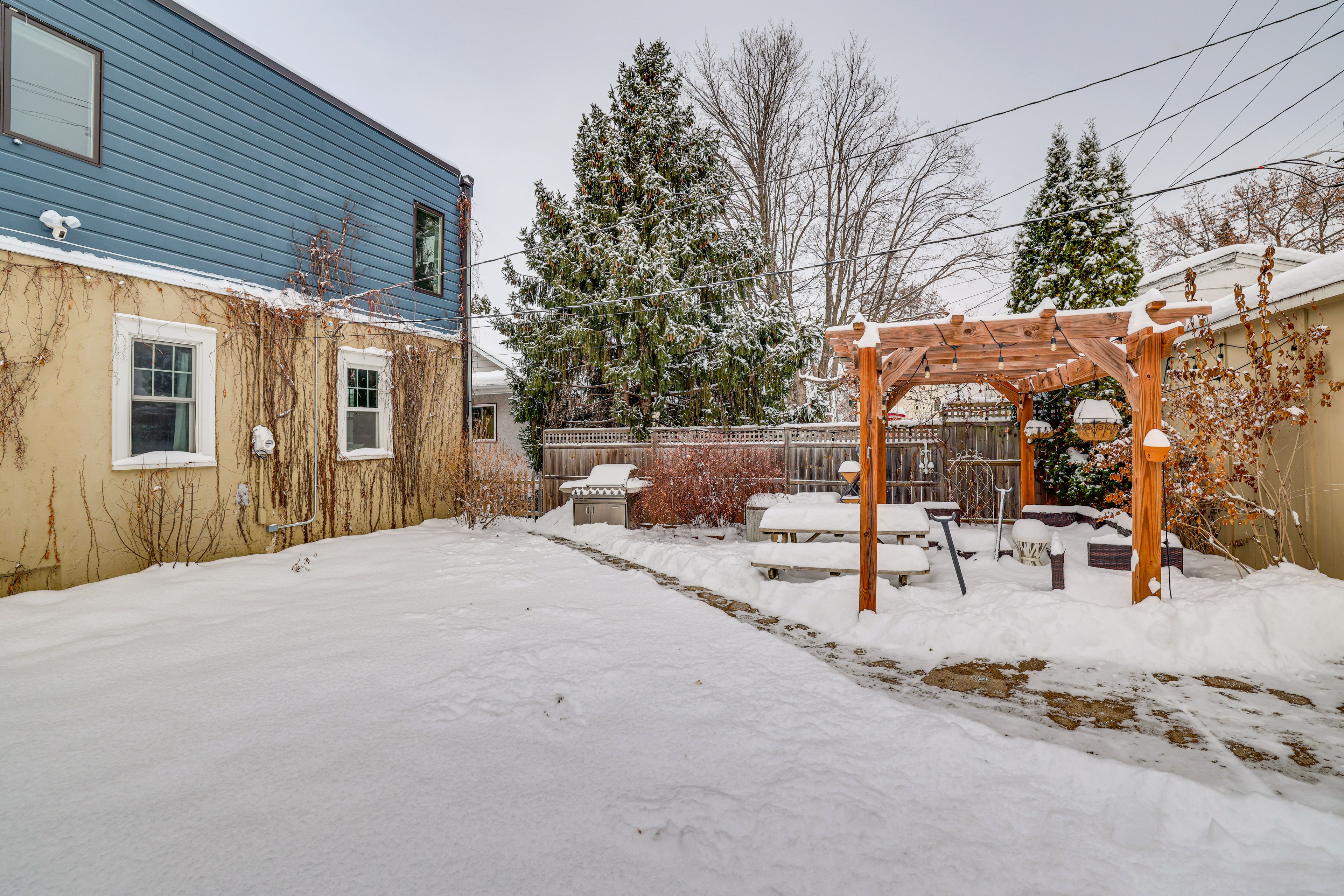 House Exterior | Seasonal Patio | Pergola | Dining Area | Gas Grill | Fire Pit