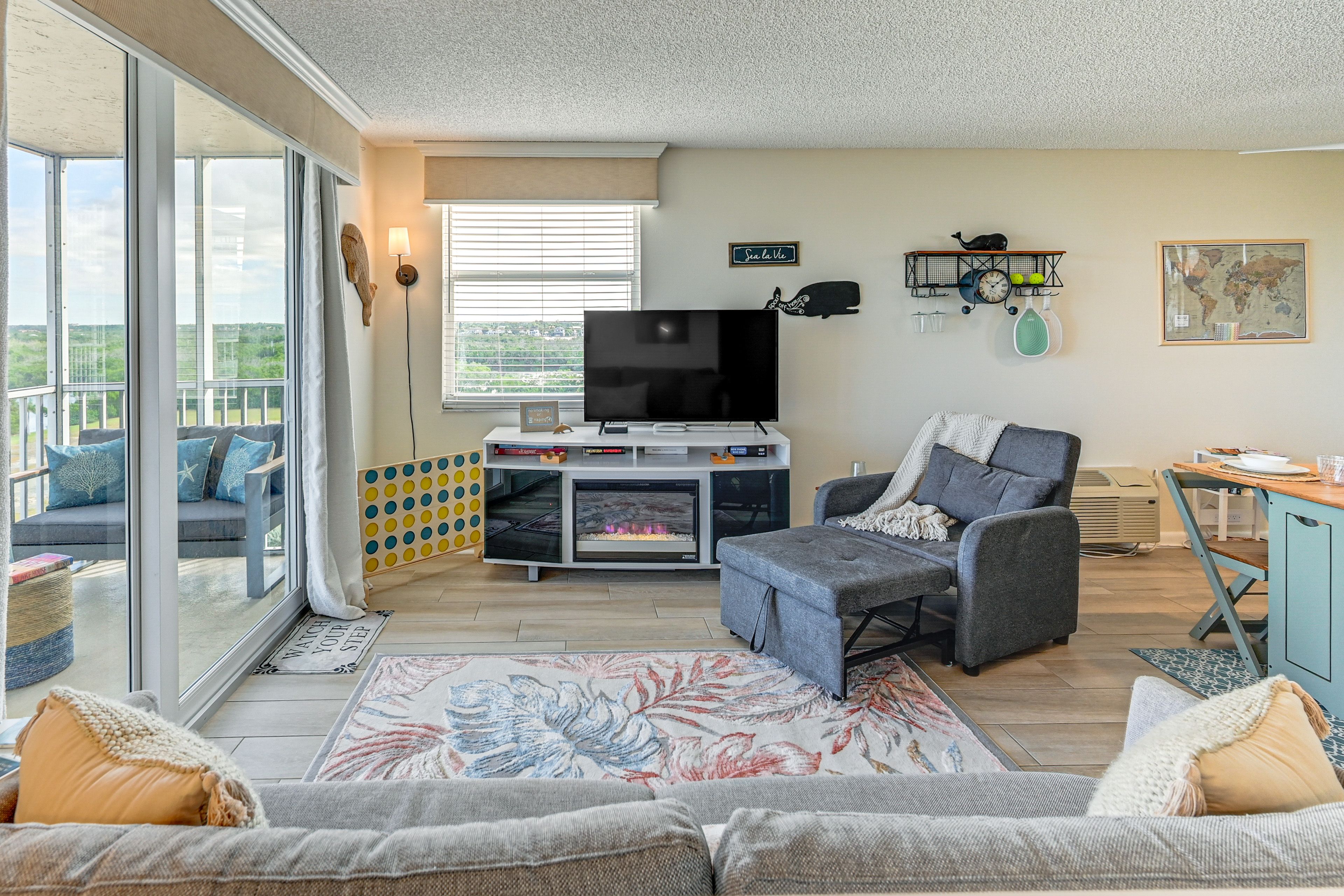 Living Space | Fireplace | Twin Sleeper Chair | Queen Sleeper Sofa