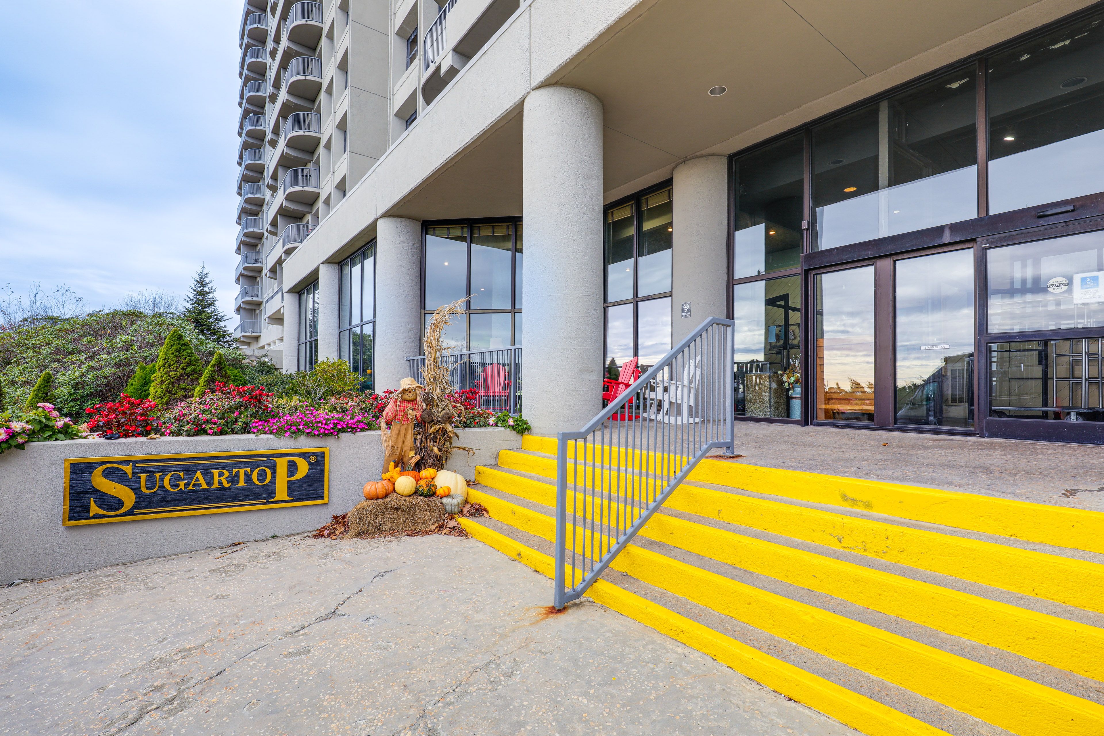 Building Exterior | Parking | Assigned Parking in Community Lot (2 Vehicles)