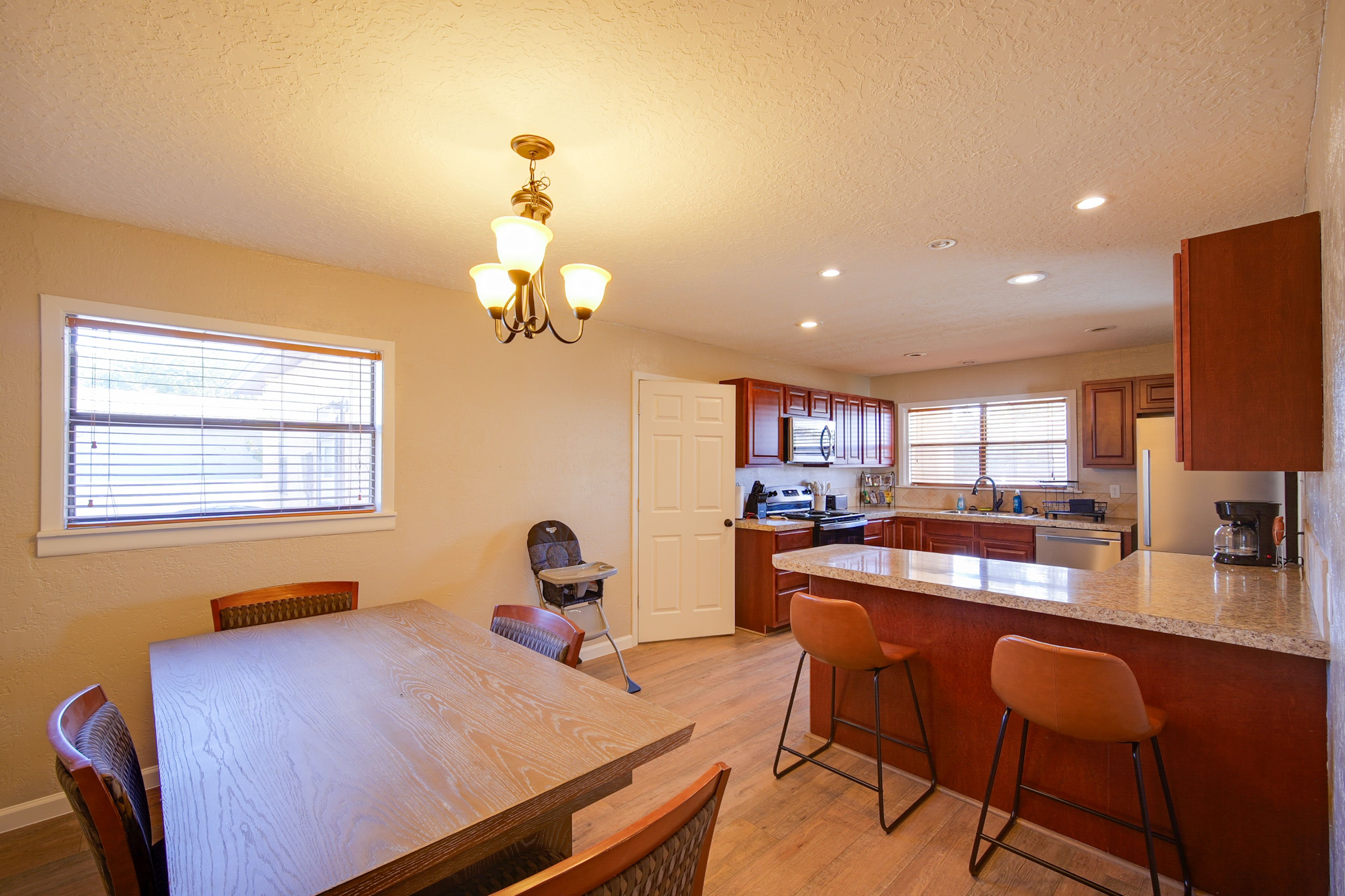 Kitchen & Dining Area | Family-Friendly Amenities | High Chair