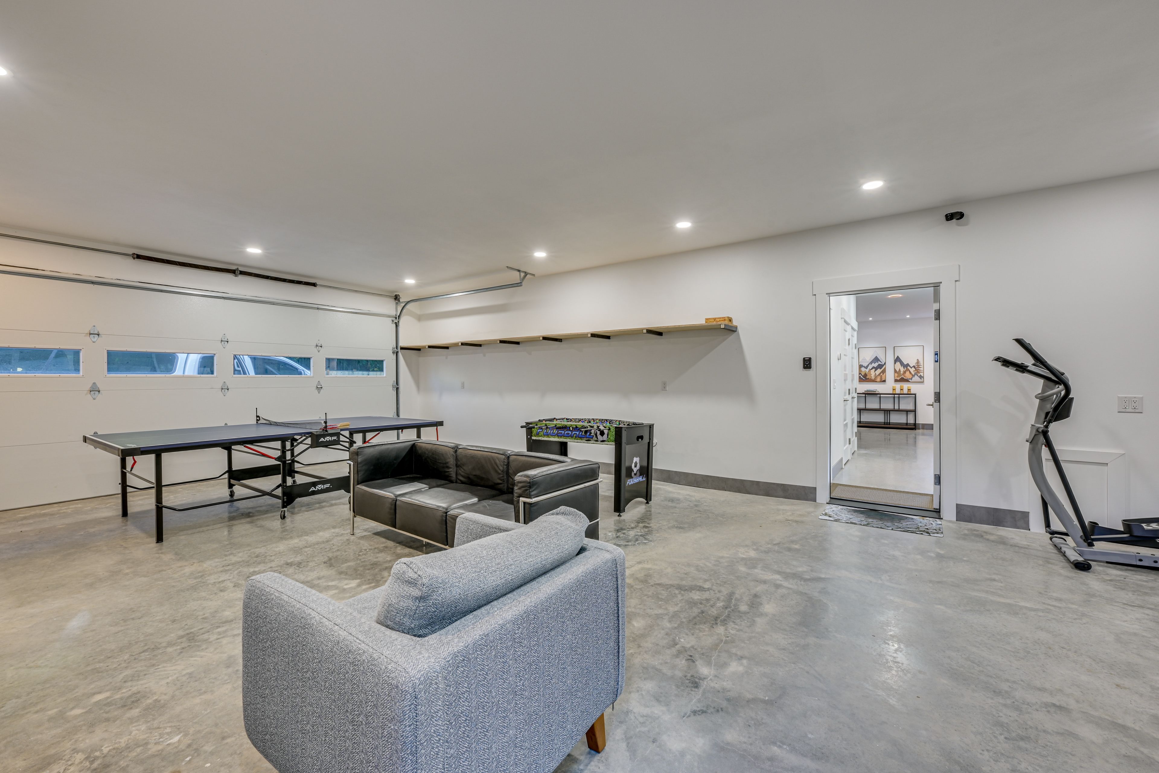 Game Room (Garage) | Smart TV | Elliptical Machine | Washer/Dryer | 1st Floor