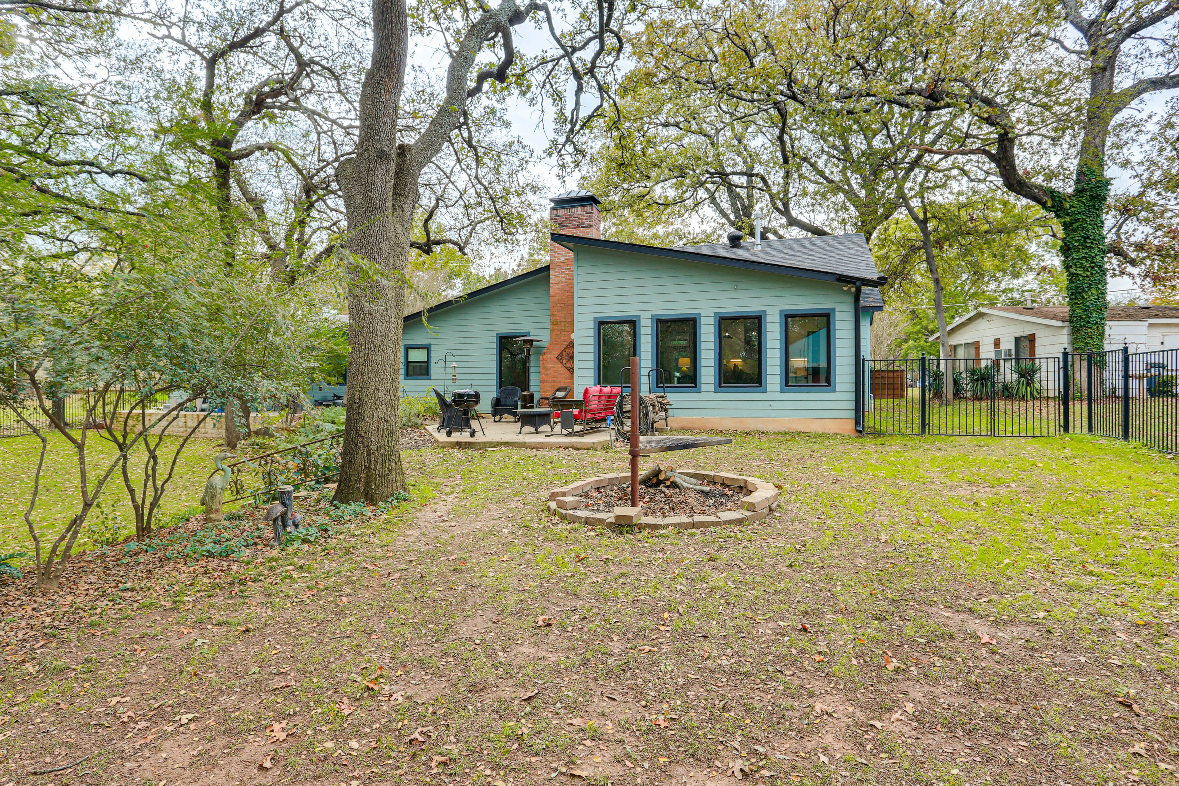 Property Exterior | Spacious Yard | Patio | Fire Pit