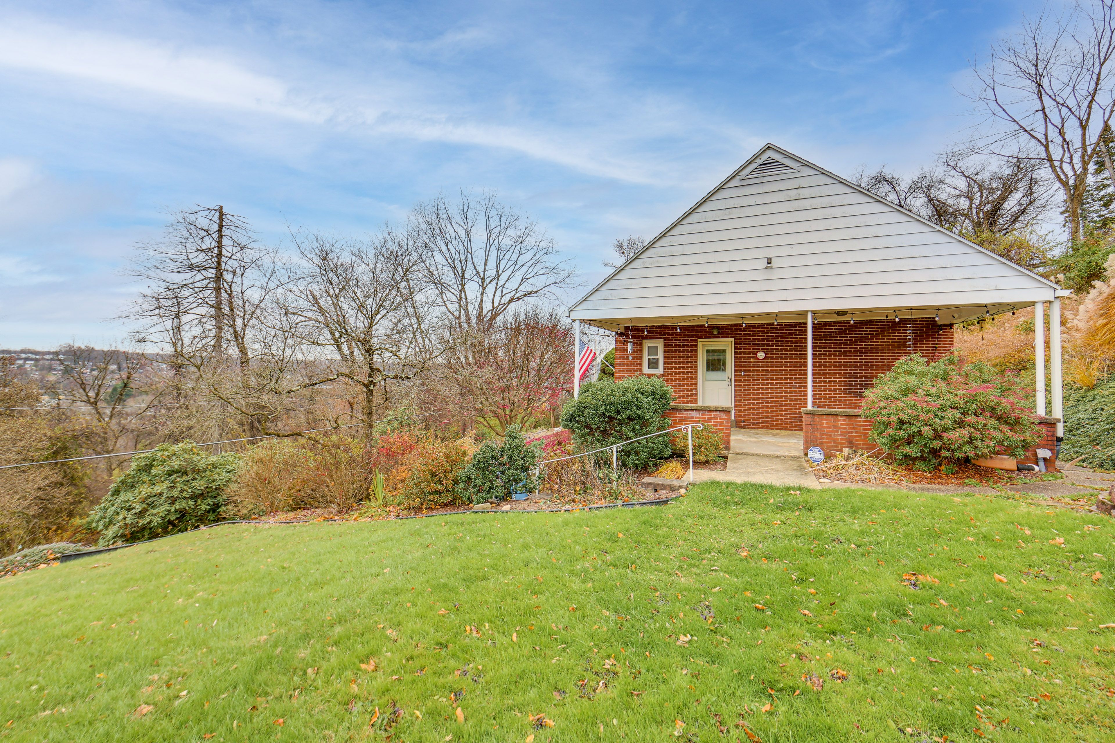 Property Exterior | Covered Patio | Spacious Yard