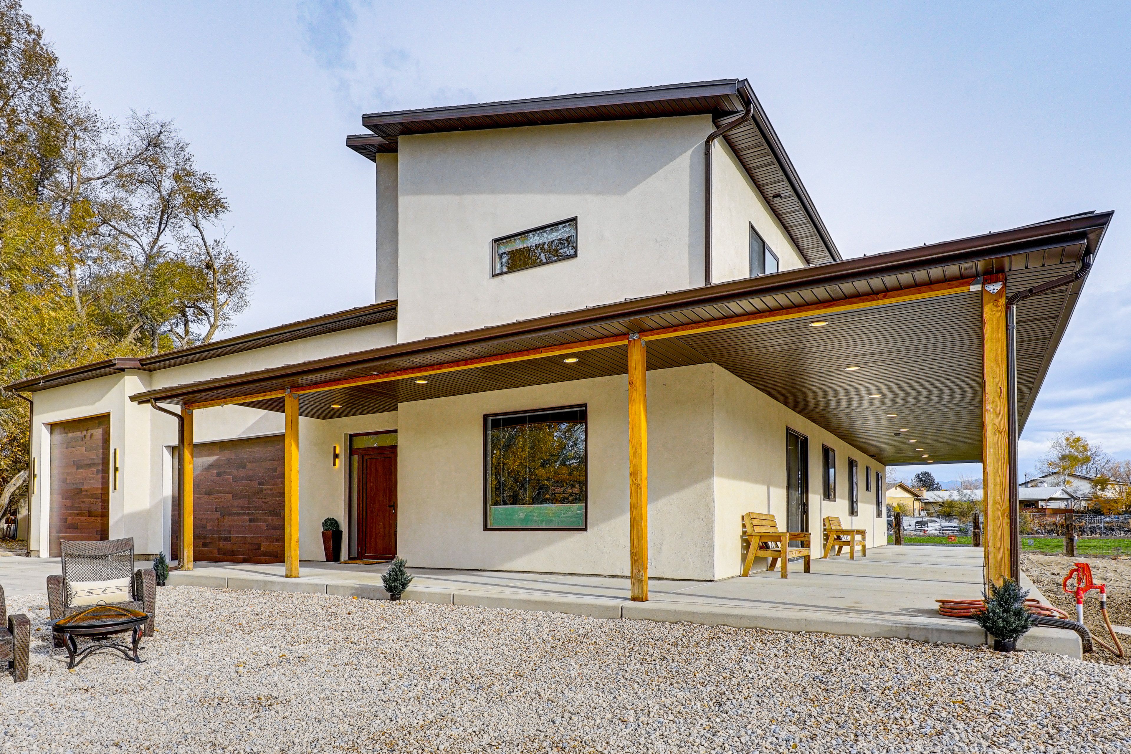 Guest House Exterior | Wood-Burning Fire Pit