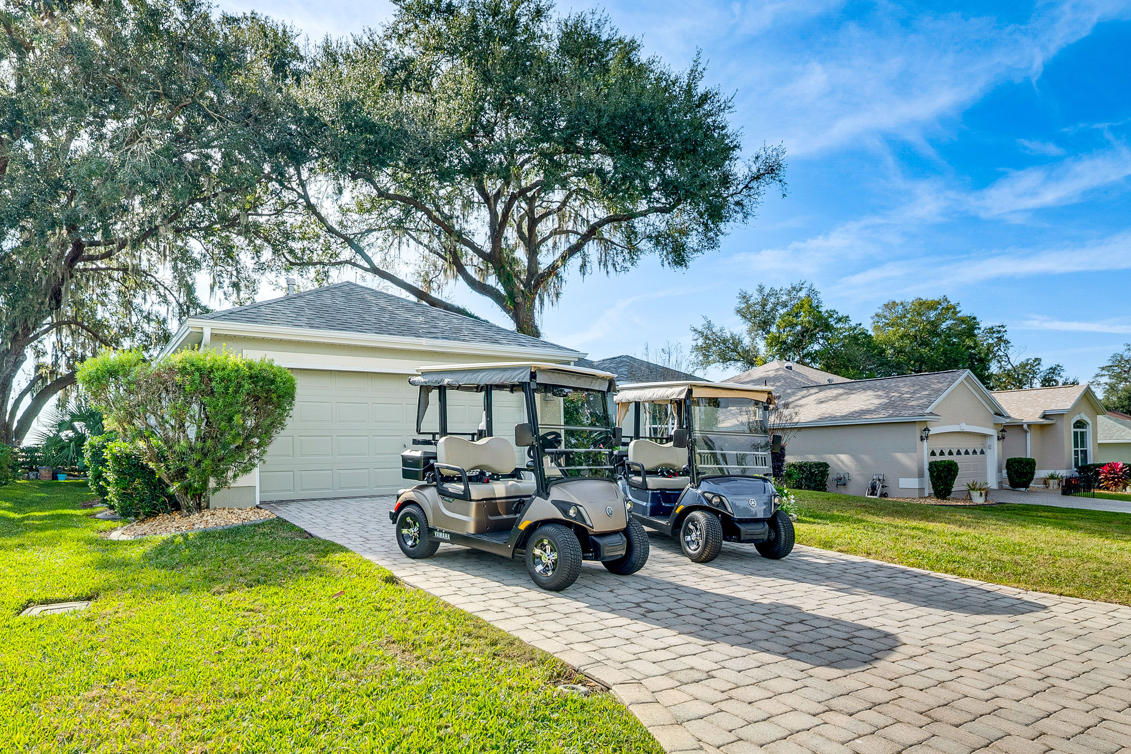 Parking | Driveway (2 Vehicles) | Garage Available for Golf Carts Only