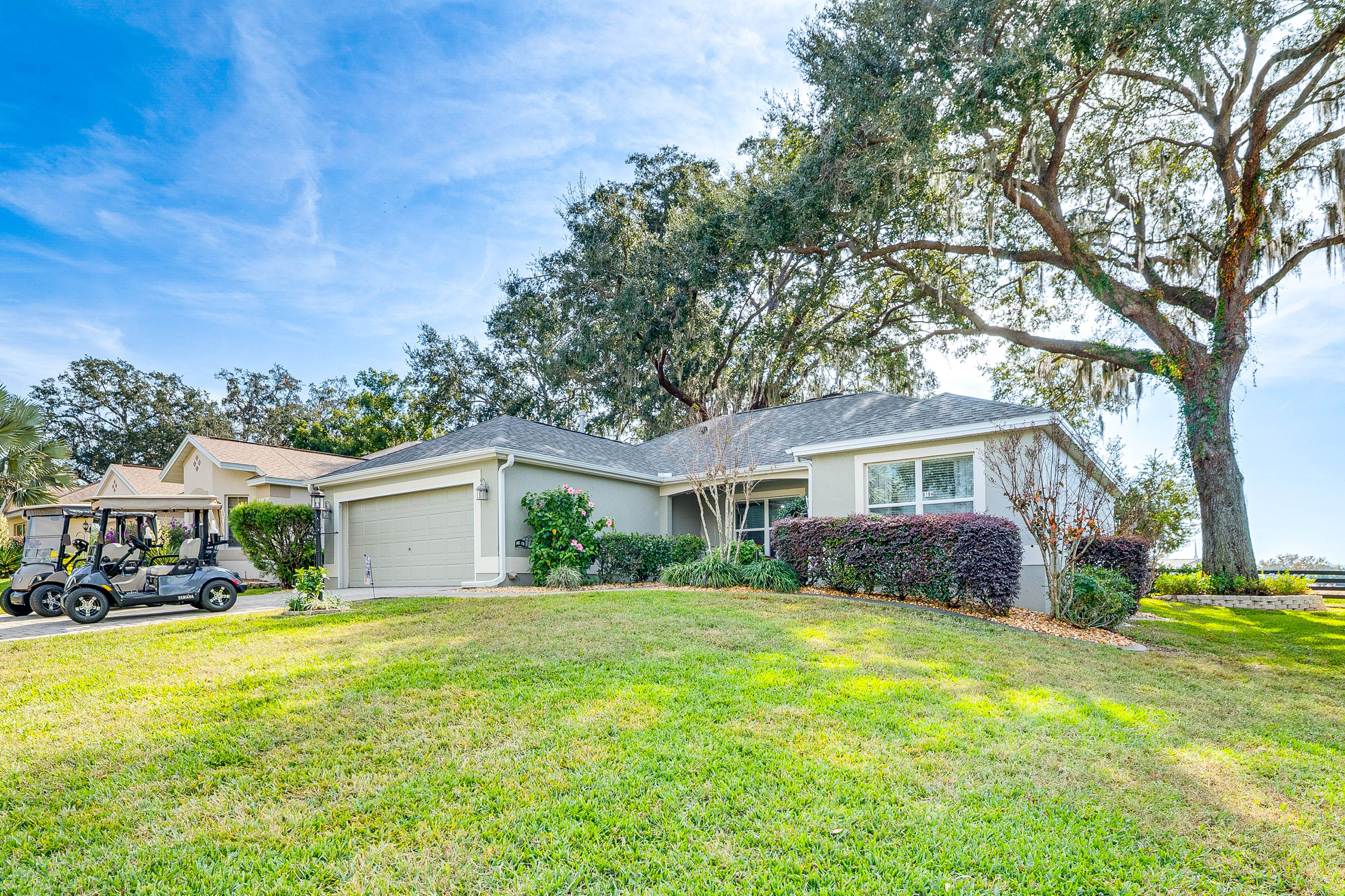 House Exterior | 2 Golf Carts Provided