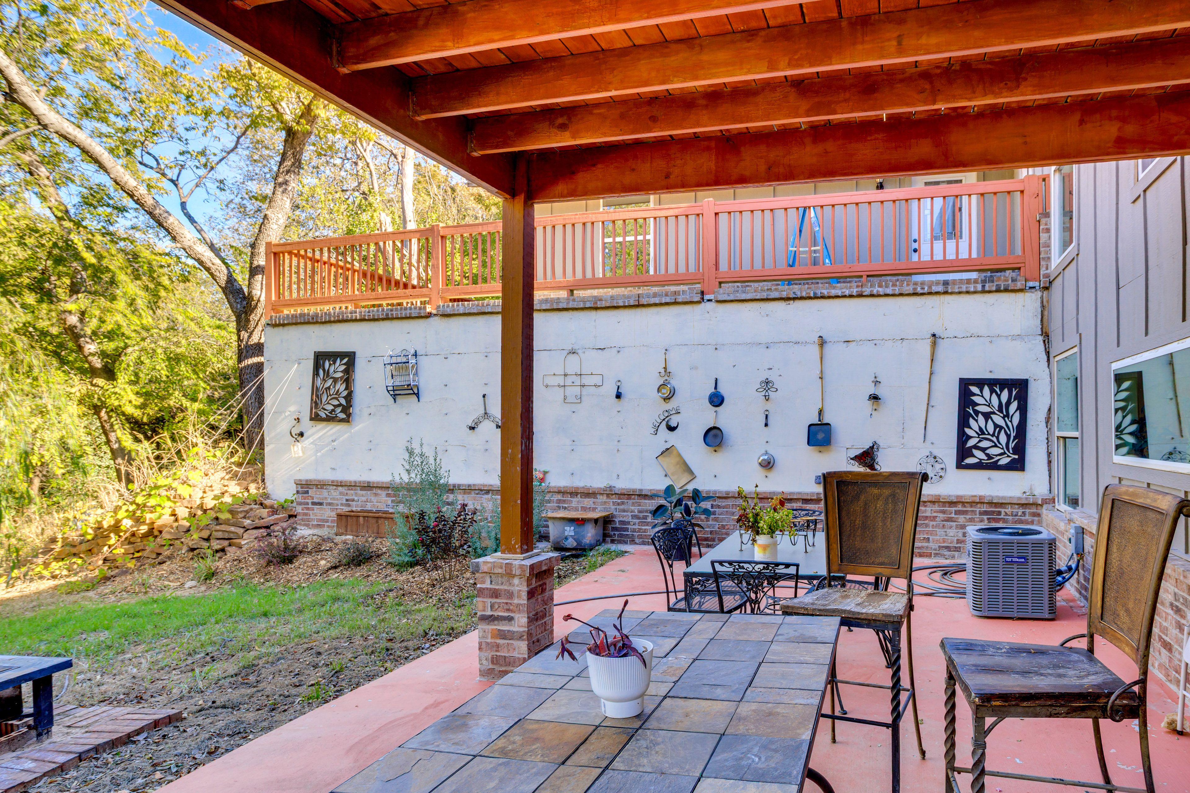 Apartment Exterior | Covered Patio w/ Seating | 2 Dining Areas | Charcoal Grill