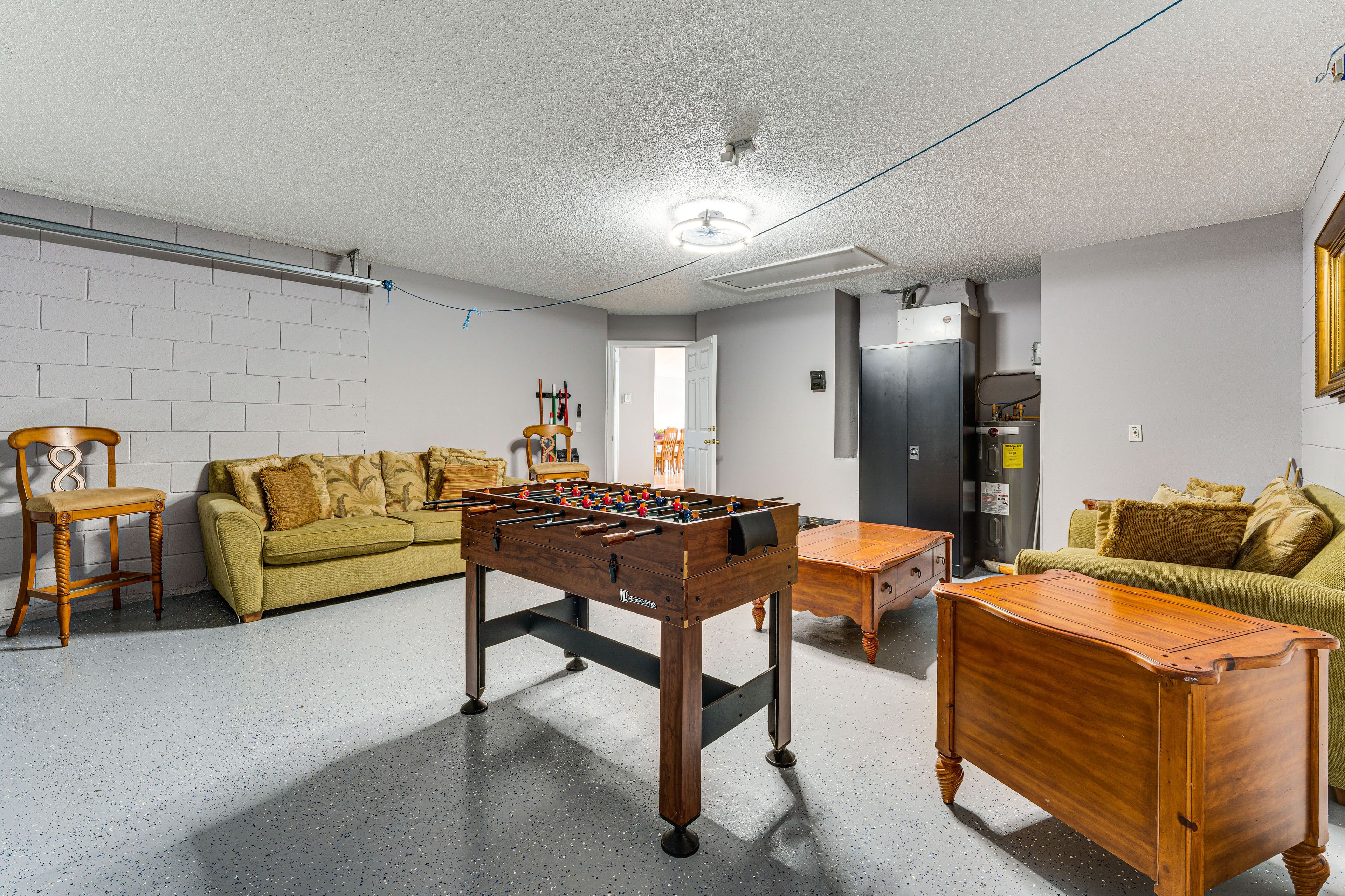 Game Area | Garage | Foosball Table | Cornhole