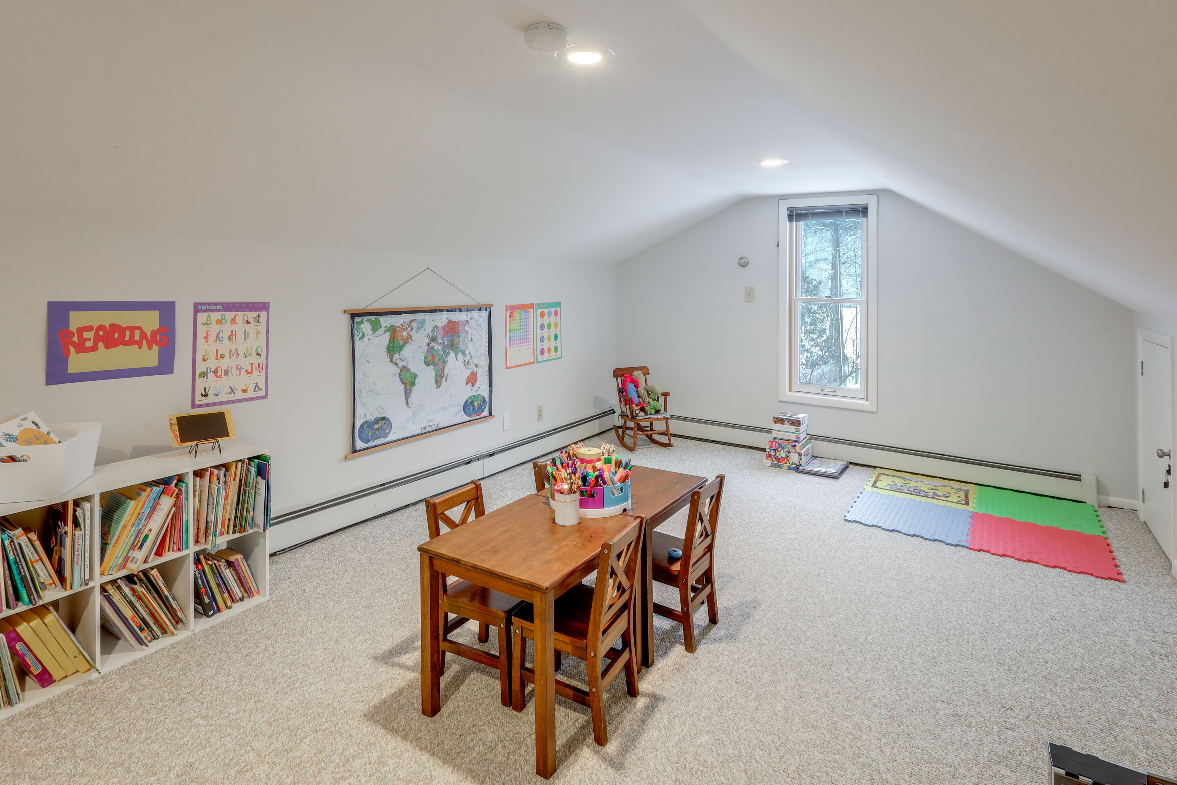 Loft | Children's Play Area | Books | Board Games | Exercise Bike | Desk