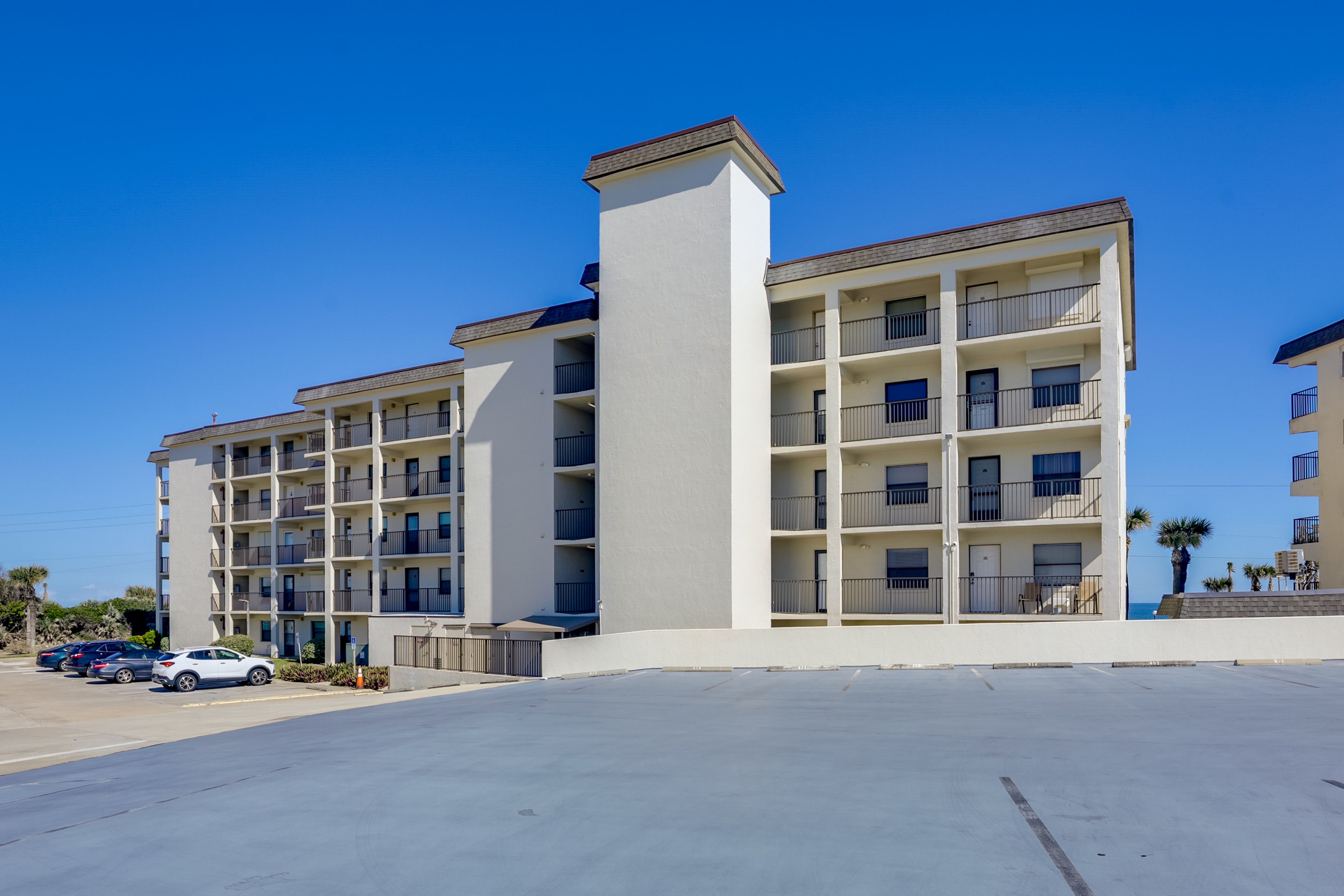 Parking | Reserved Community Garage Spot (1 Vehicle) | Additional Overflow Lot