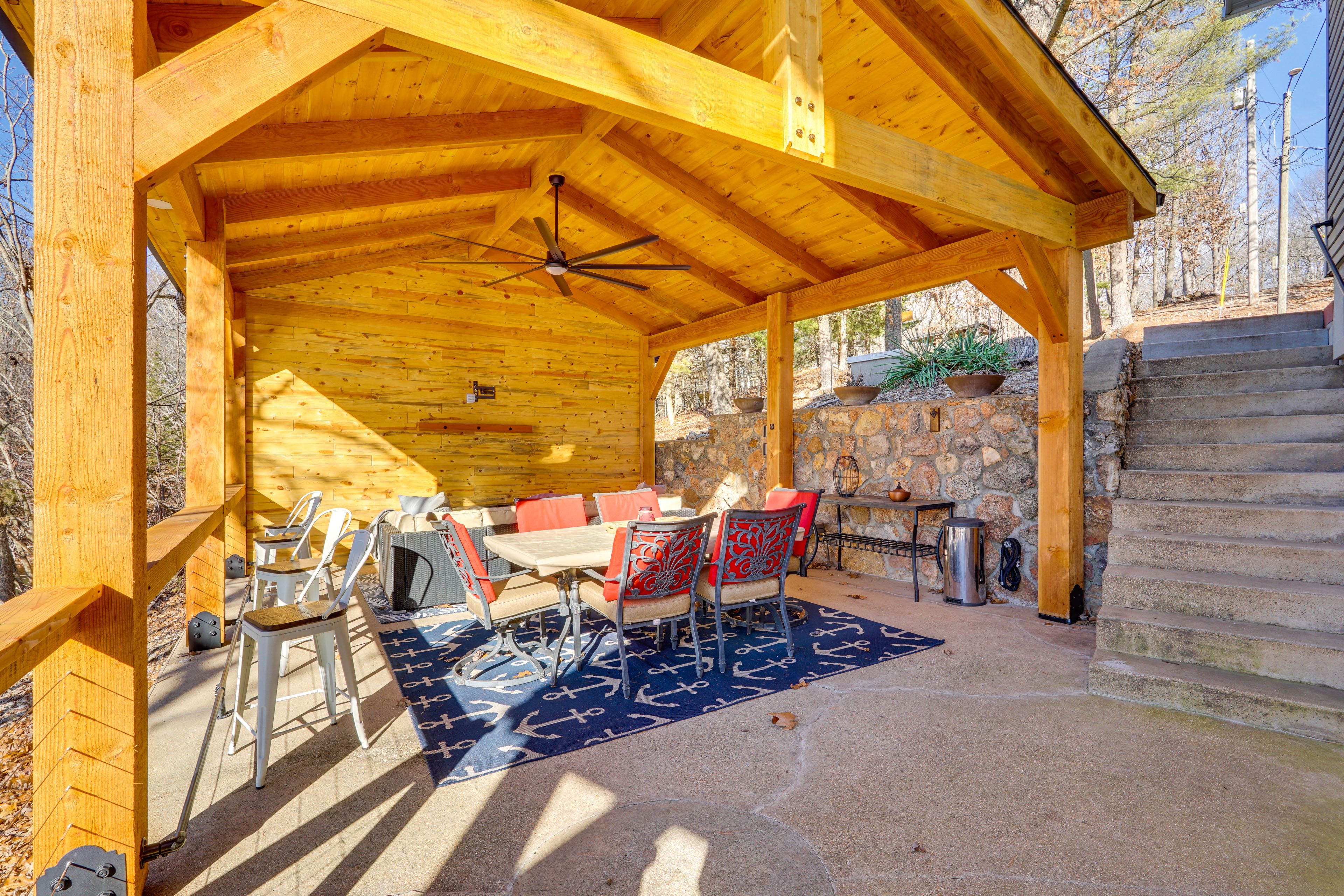 House Exterior | Pavilion w/ Dining Area, Couch, TV & Fire Table