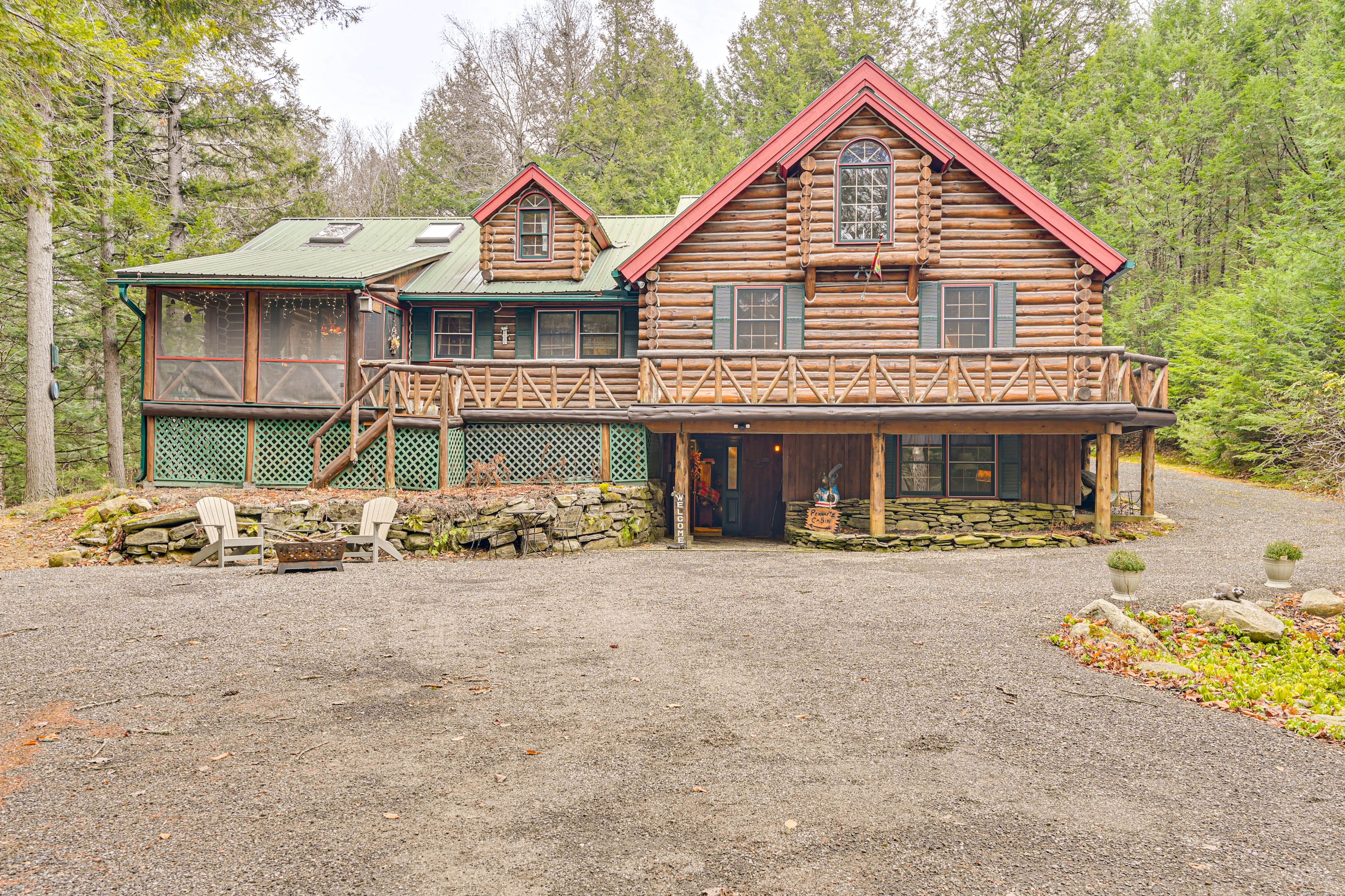 Cabin Exterior | On-Site Pond & Hiking Trails