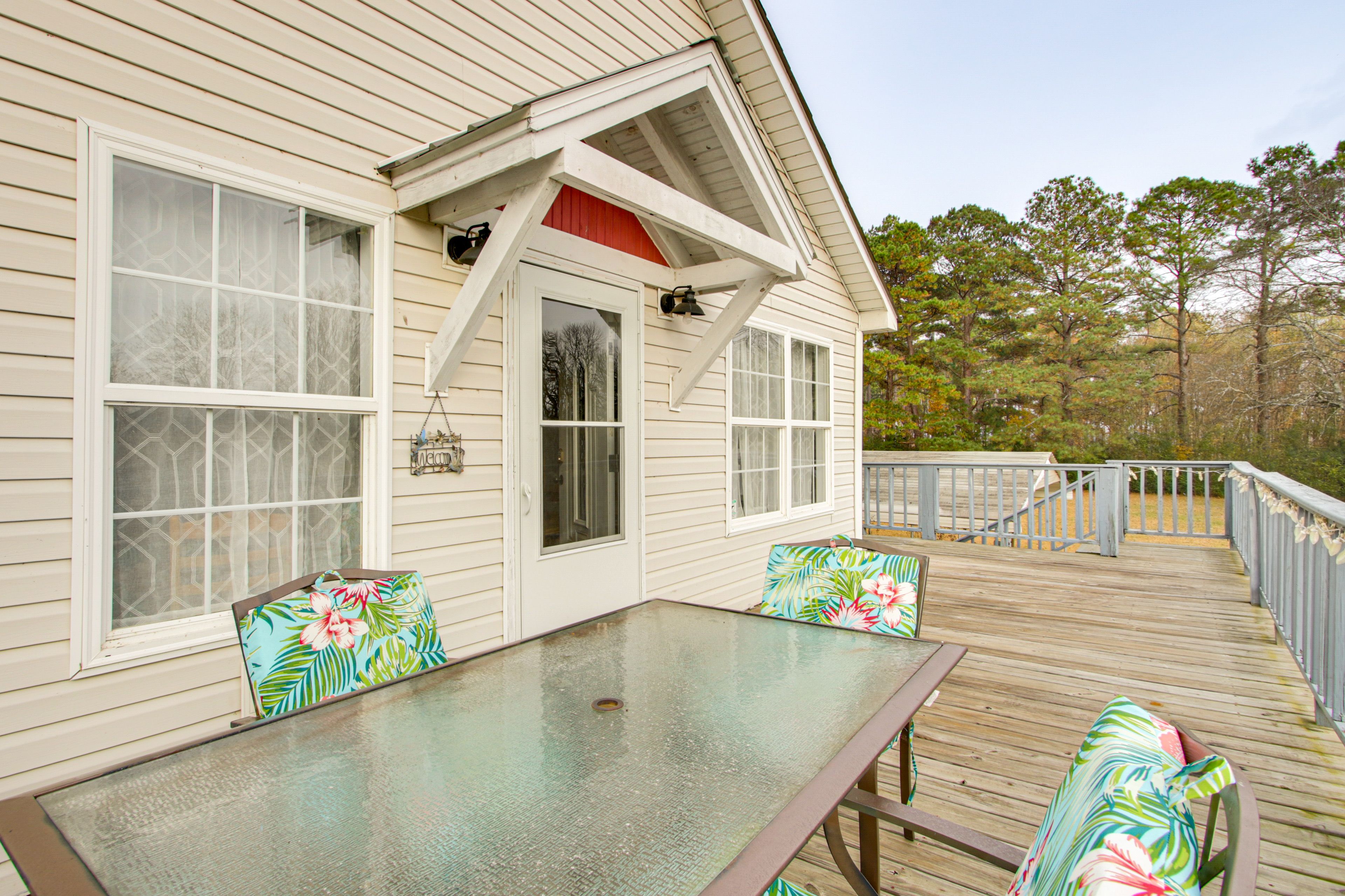 Wraparound Deck | Dining Area | Forested Views