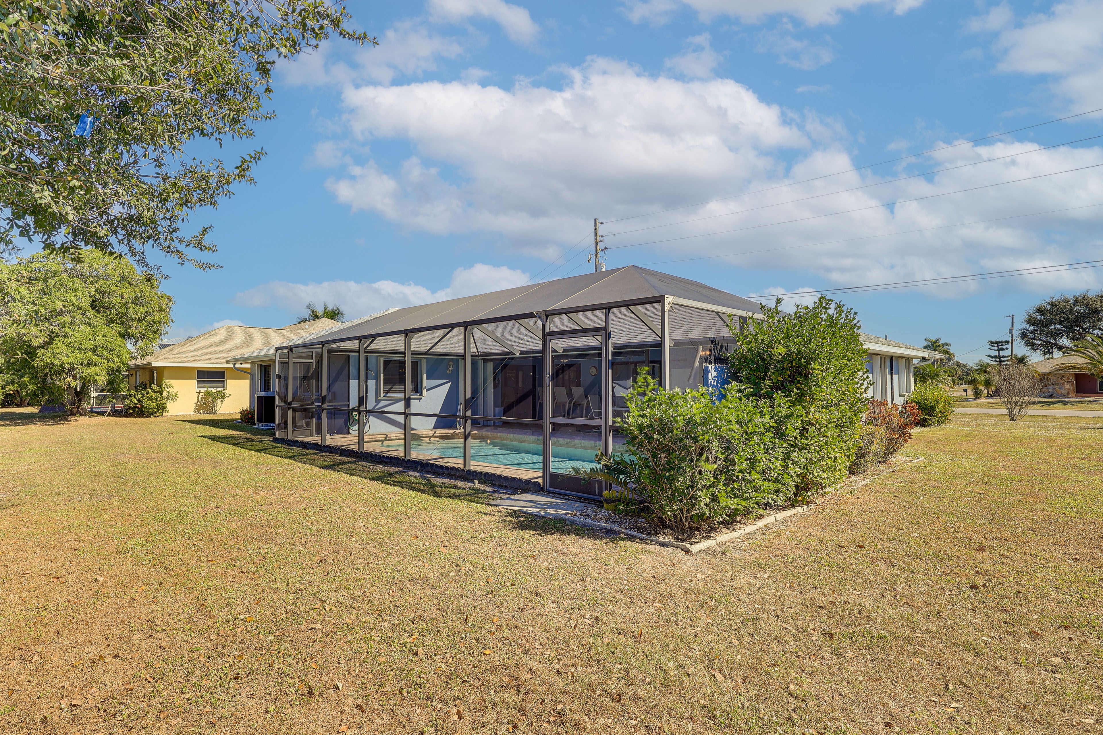 Spacious Yard | Screened-In Lanai w/ Private Pool
