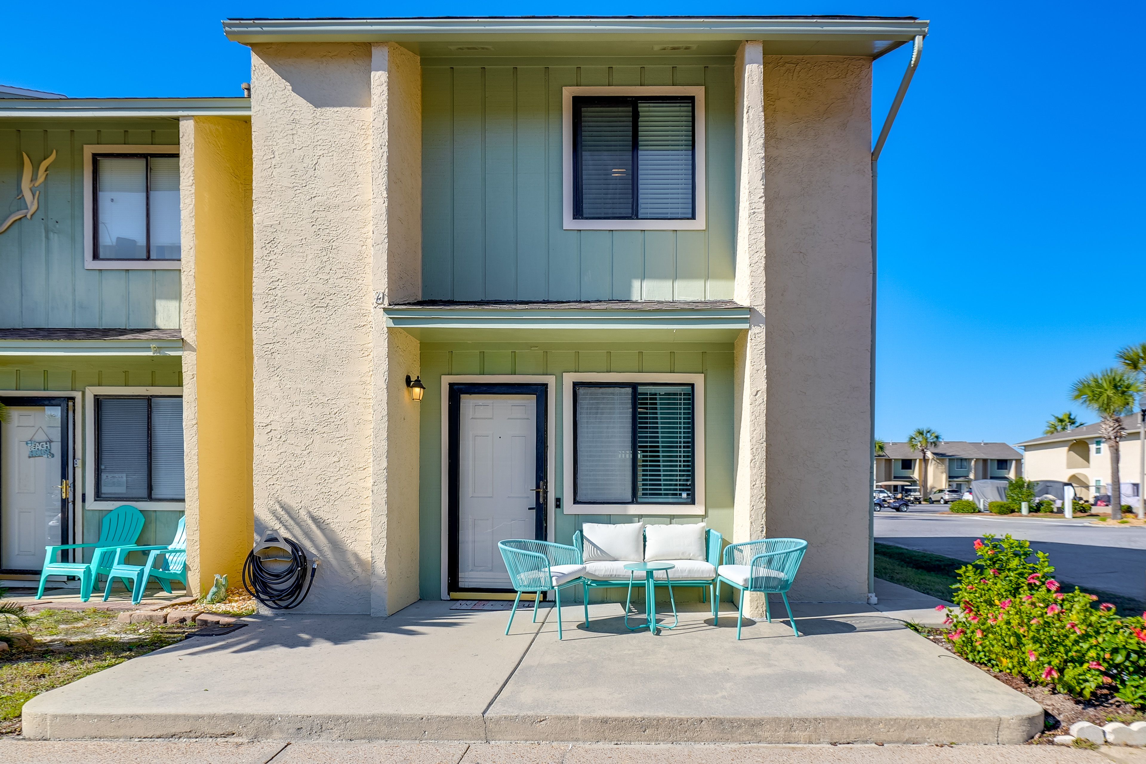 Townhouse Exterior | Corner Unit | Community Surface Lot (2 Vehicles)