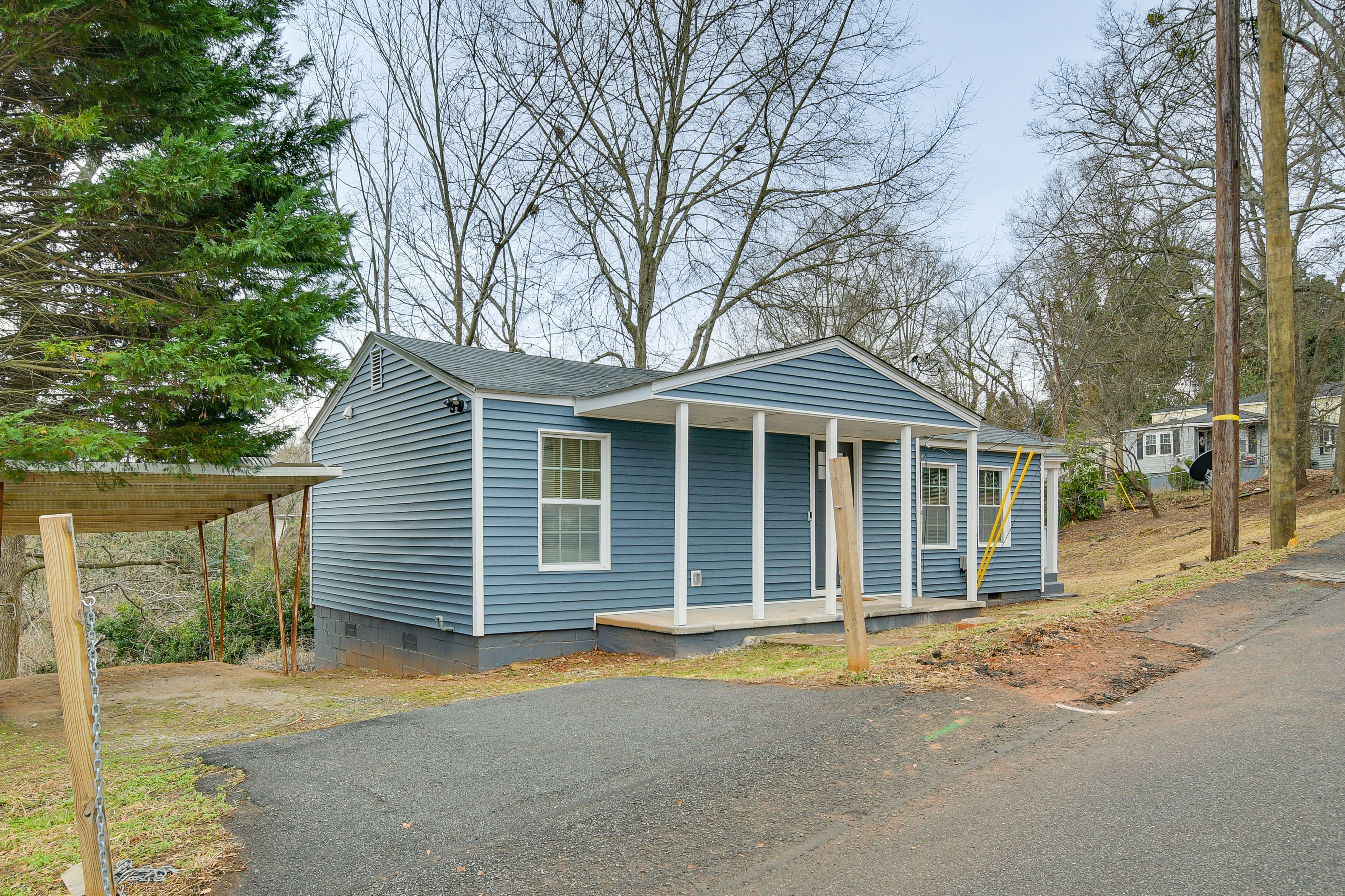 Front Exterior | Parking | Driveway w/ Carport (2 Vehicles)