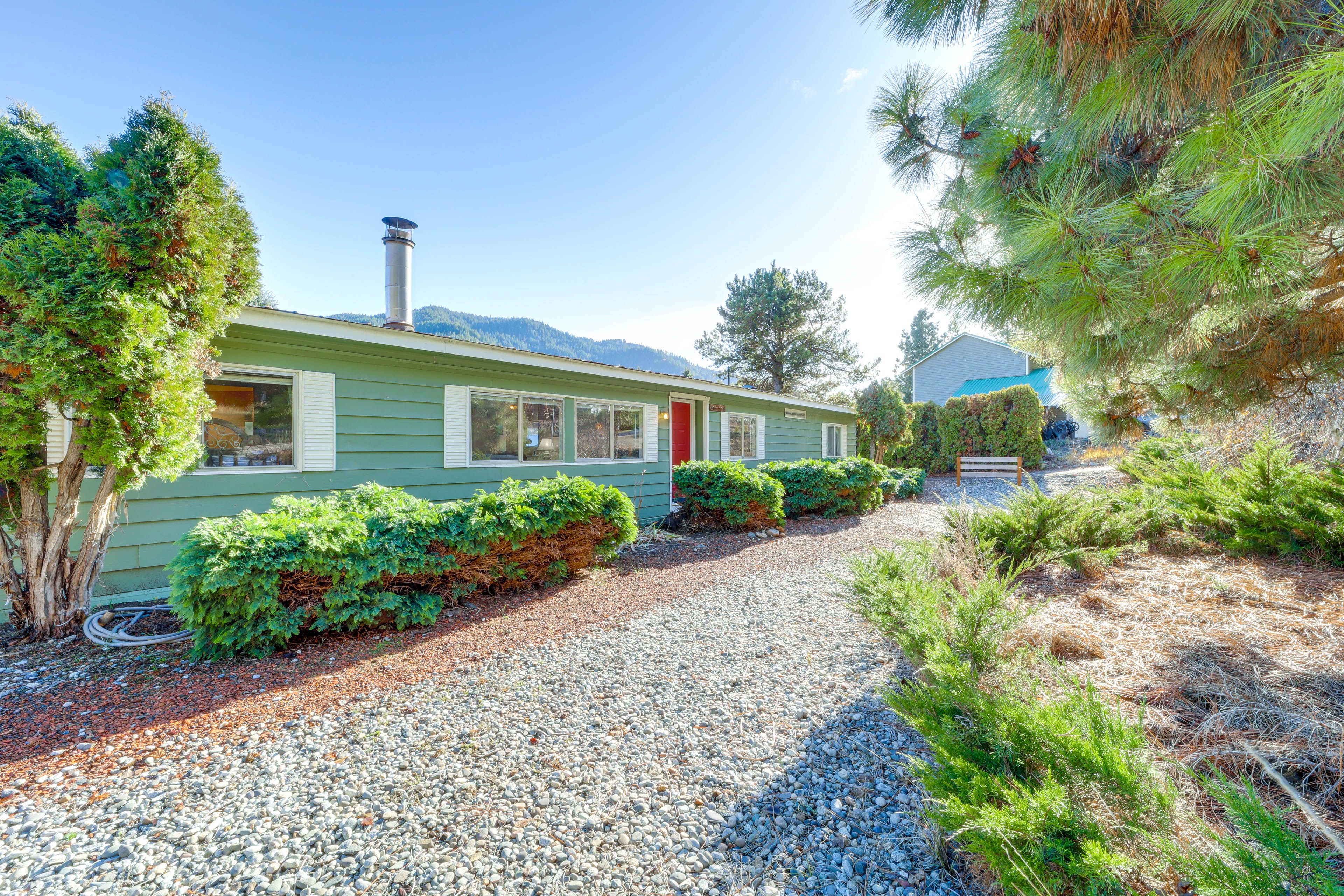 Cottage Exterior | Nearby Community Pond & Playground | Mountain Views