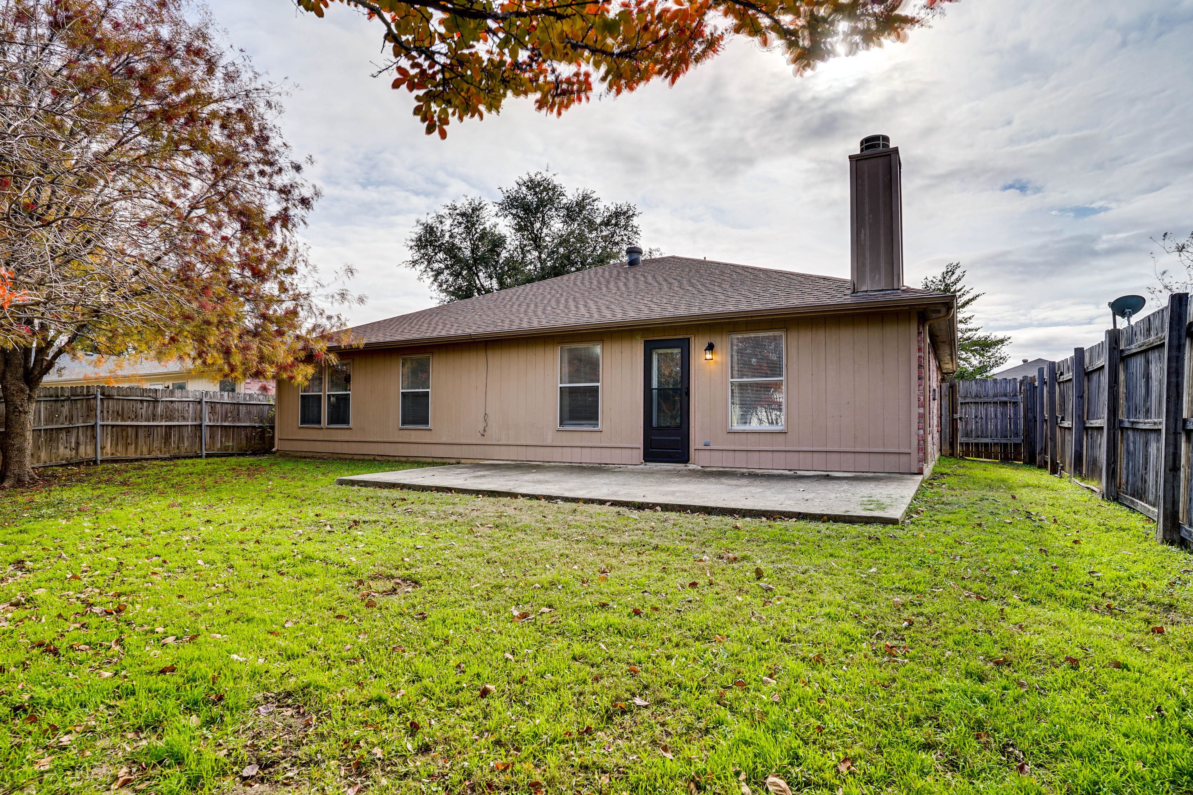 House Exterior | Patio | Fenced Backyard
