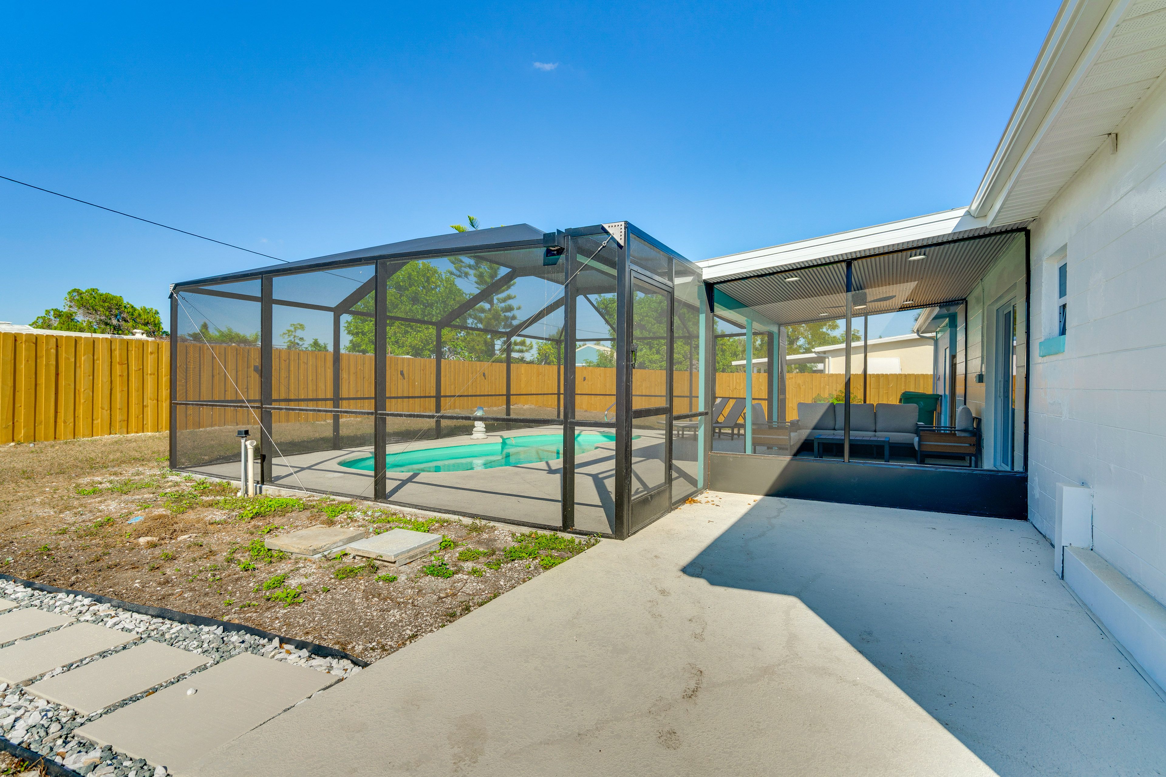 House Exterior | Fenced Backyard | Patio w/ Dining Area