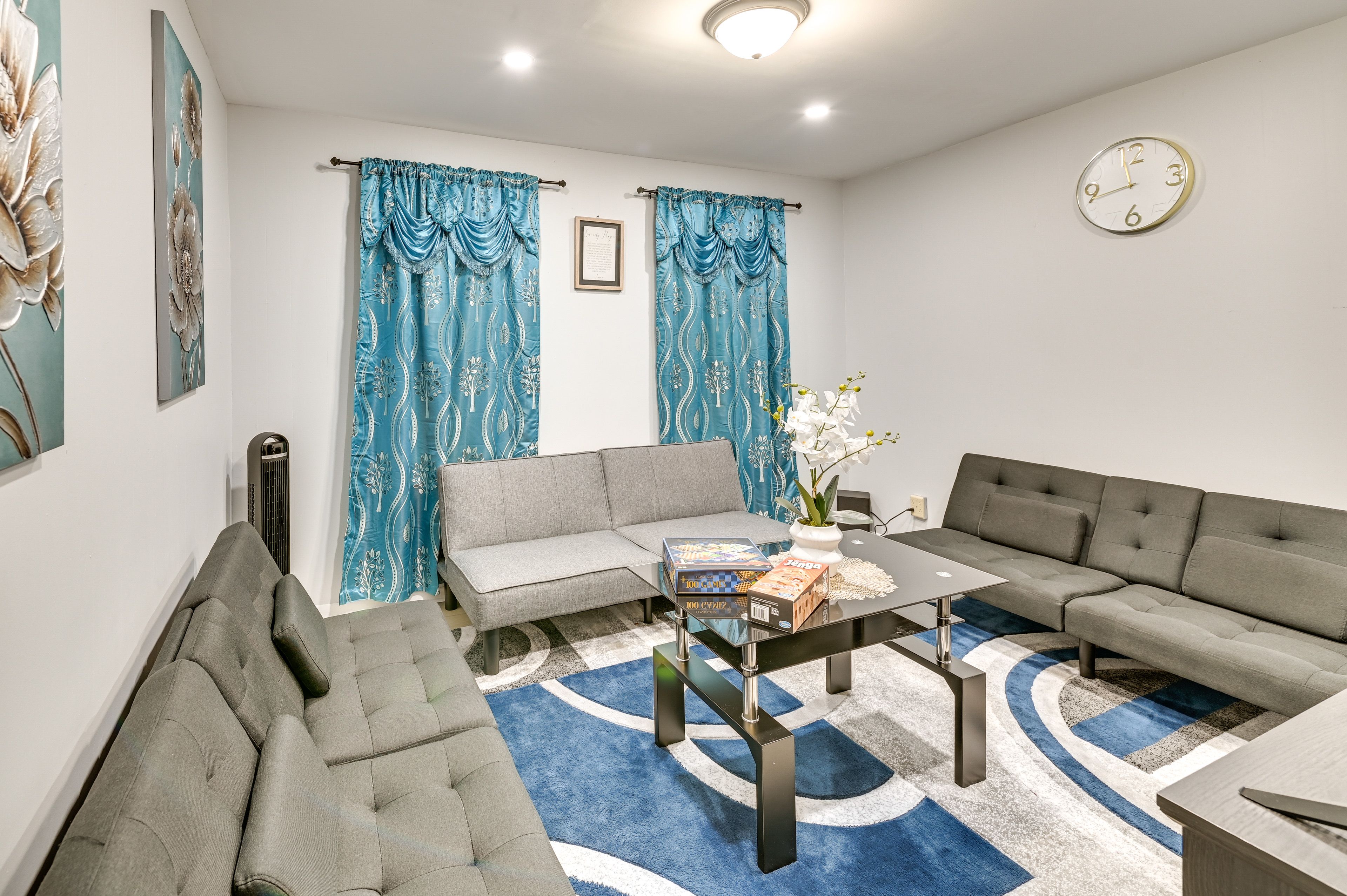 Living Room | 3 Full Futons | Free WiFi | Smart TV | Electric Fireplace