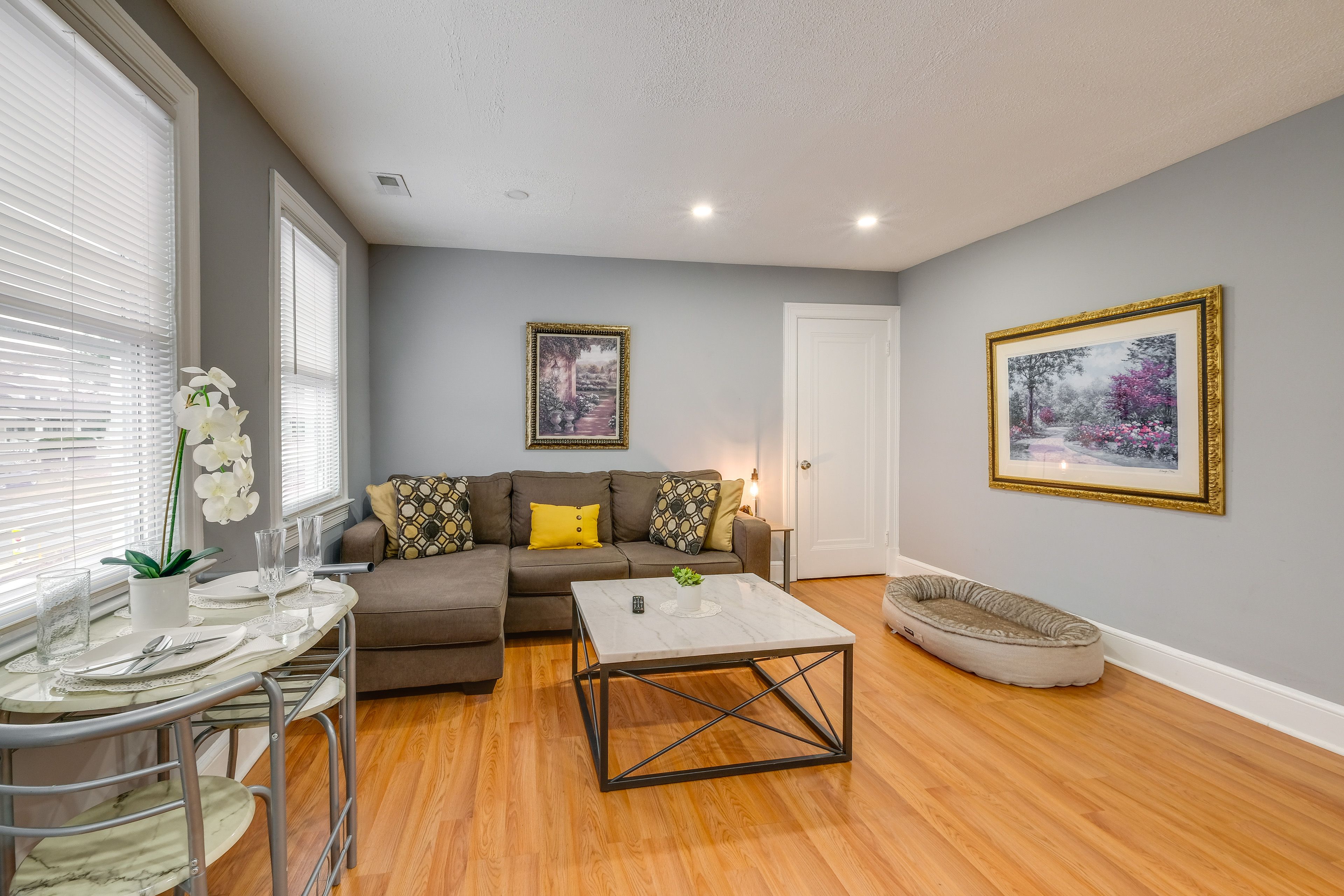 Living Room | Full Sleeper Sofa | 2-Person Dining Table | Dishware & Flatware