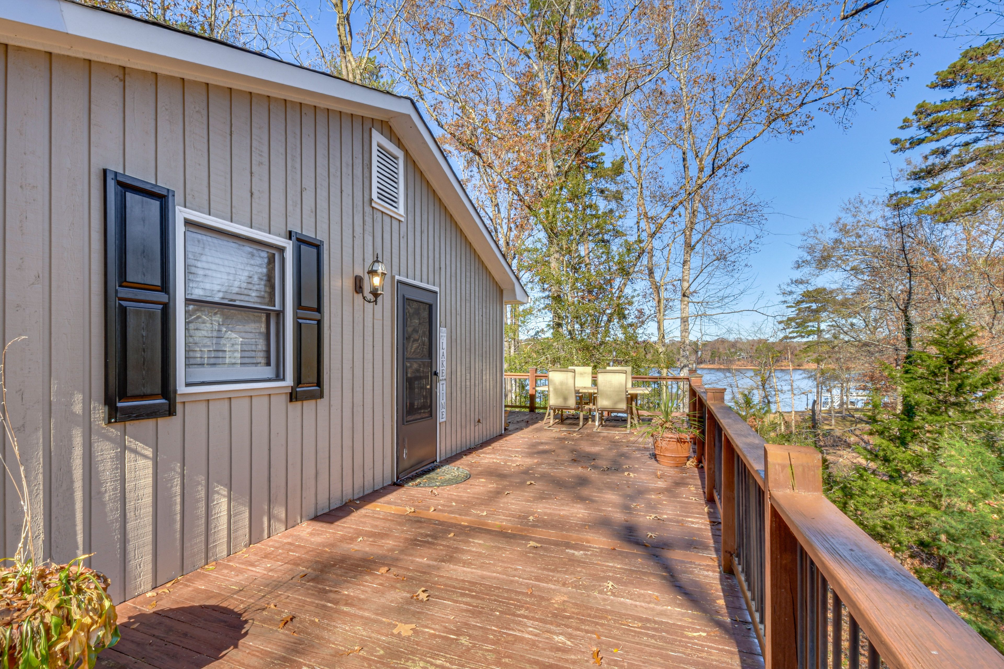 Wraparound Deck | Gas Grill | Dining Area | Lake Views