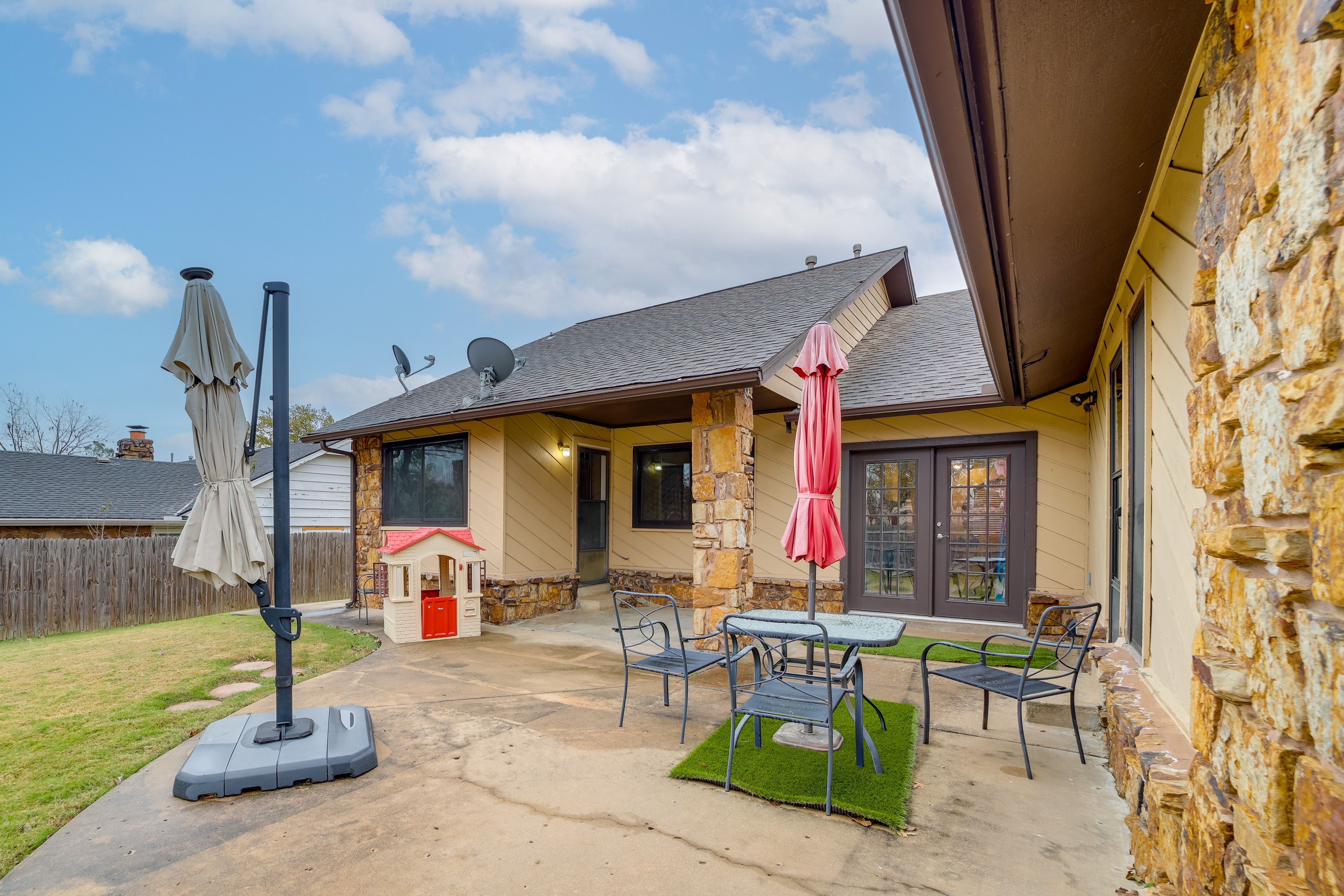 House Exterior | Furnished Patio | Dining Area w/ Umbrella