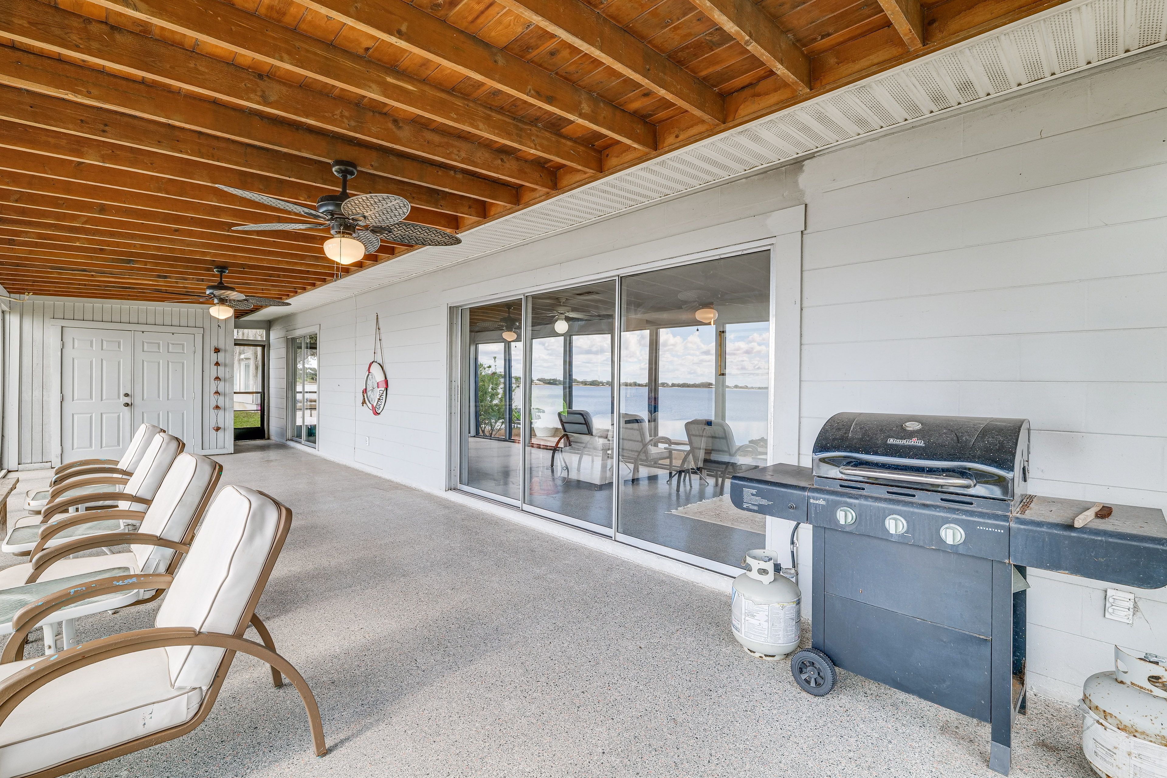Enclosed Patio | Seating | Gas Grill | Lake Views