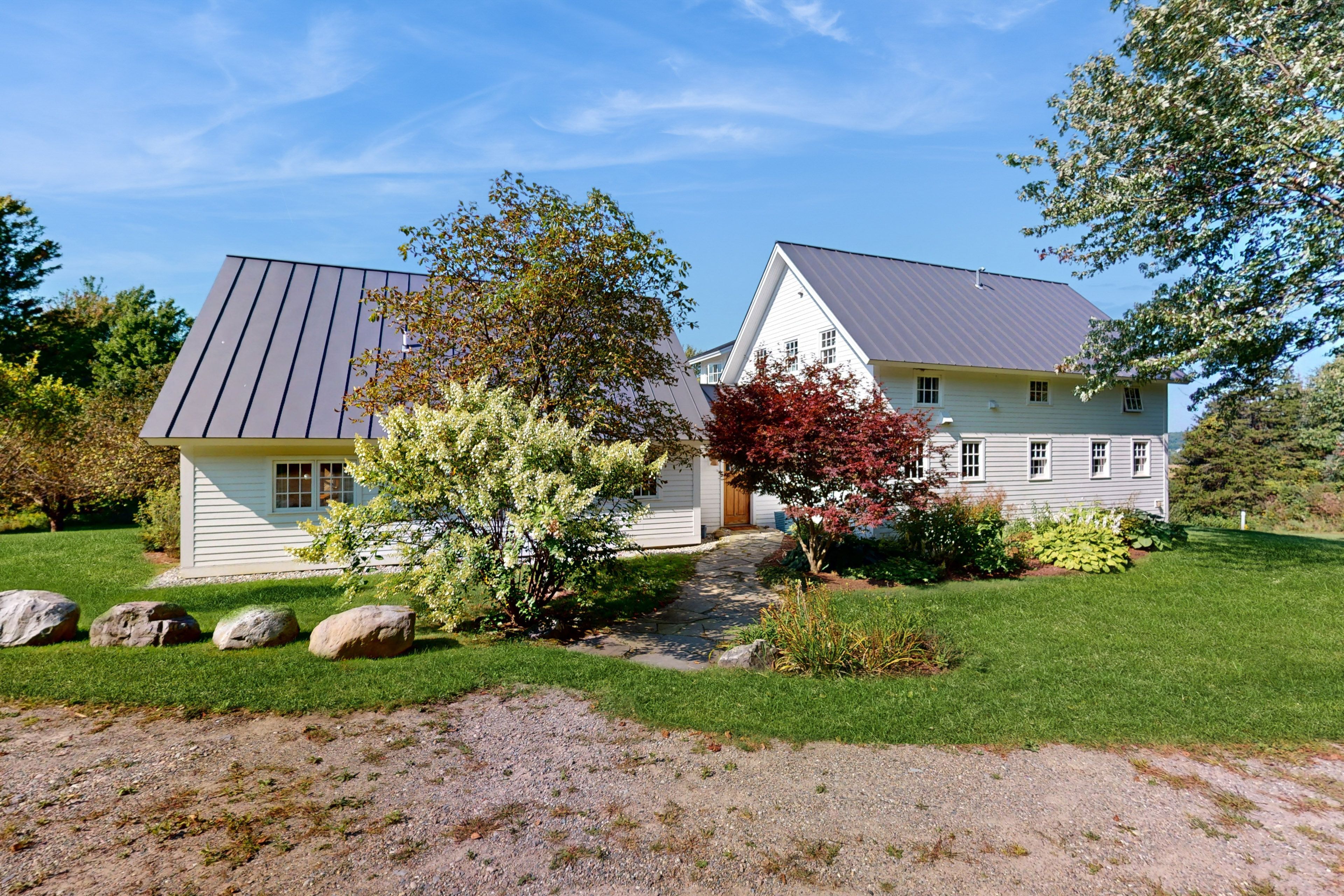 Exterior | Spacious Yard | Driveway Parking (4 Vehicles)