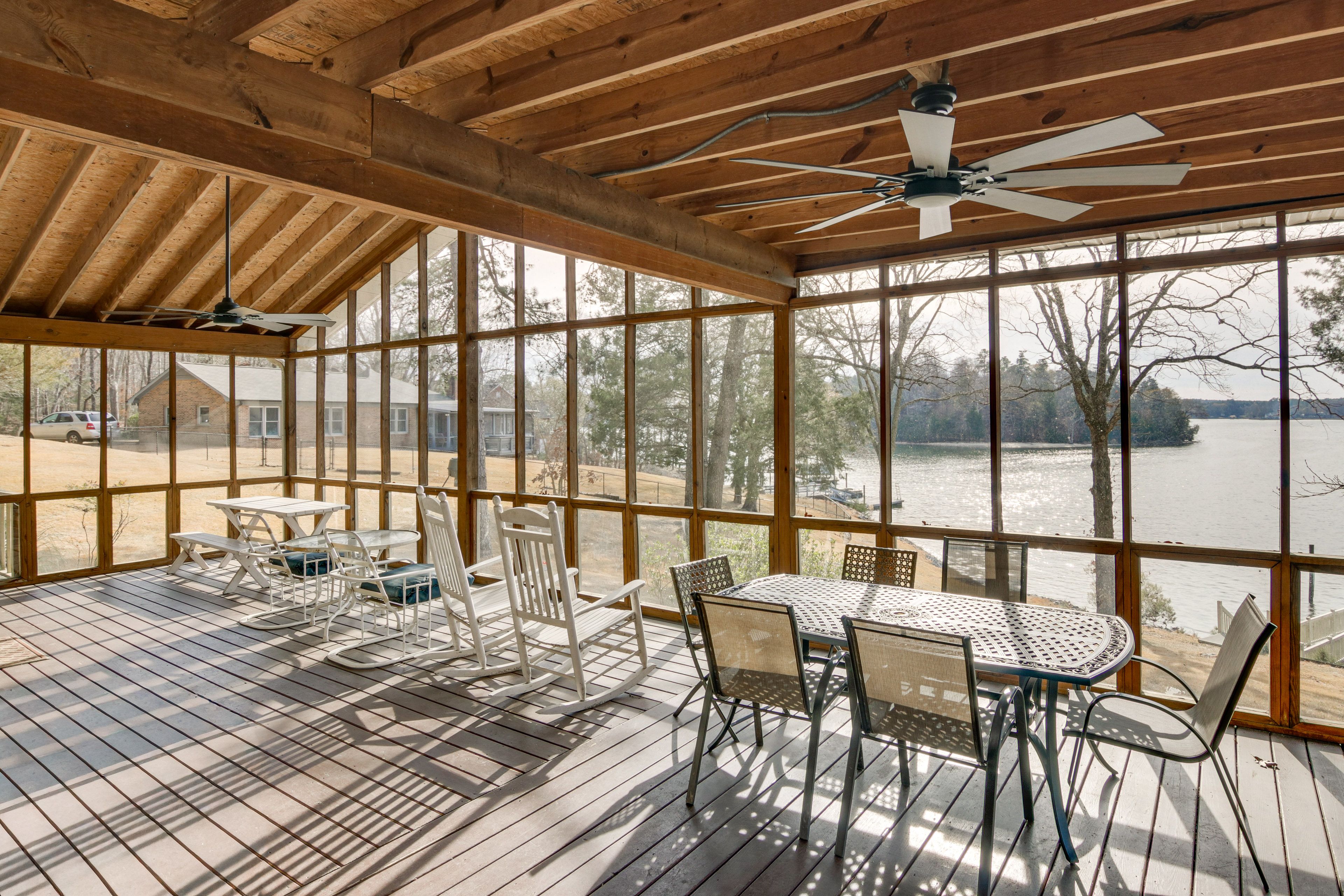 Cabin Exterior | Screened Deck w/ Dining Areas & Seating