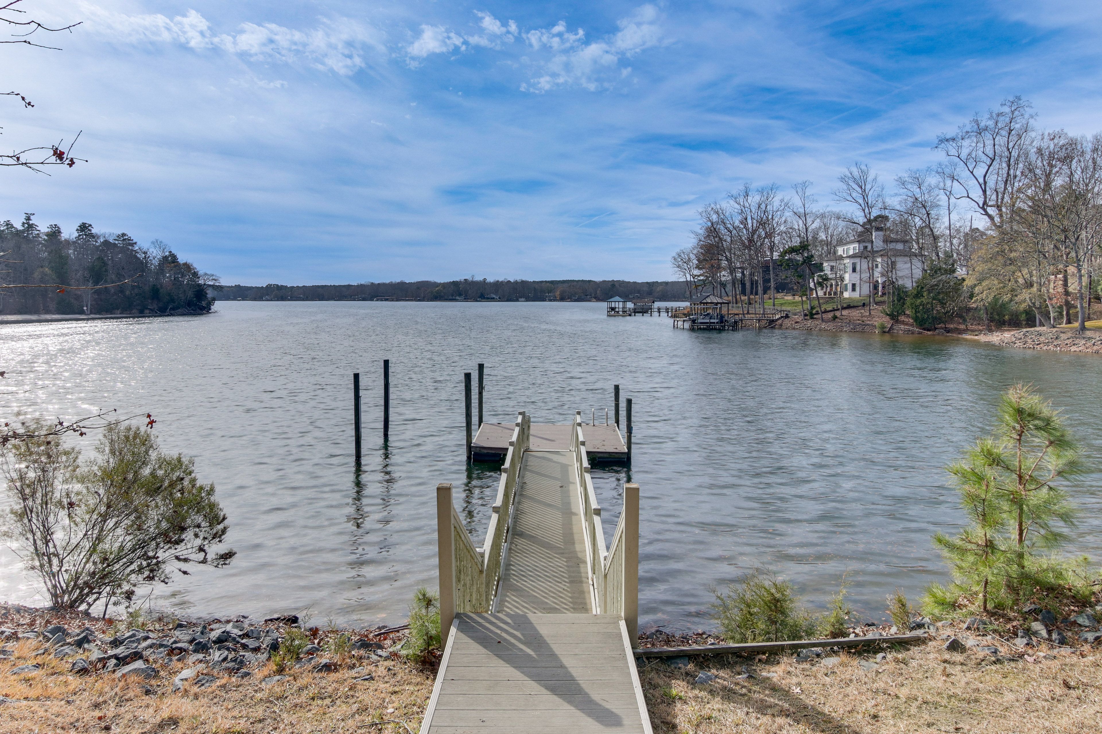Cabin Exterior | Private Dock w/ Boat Access | Lake Views