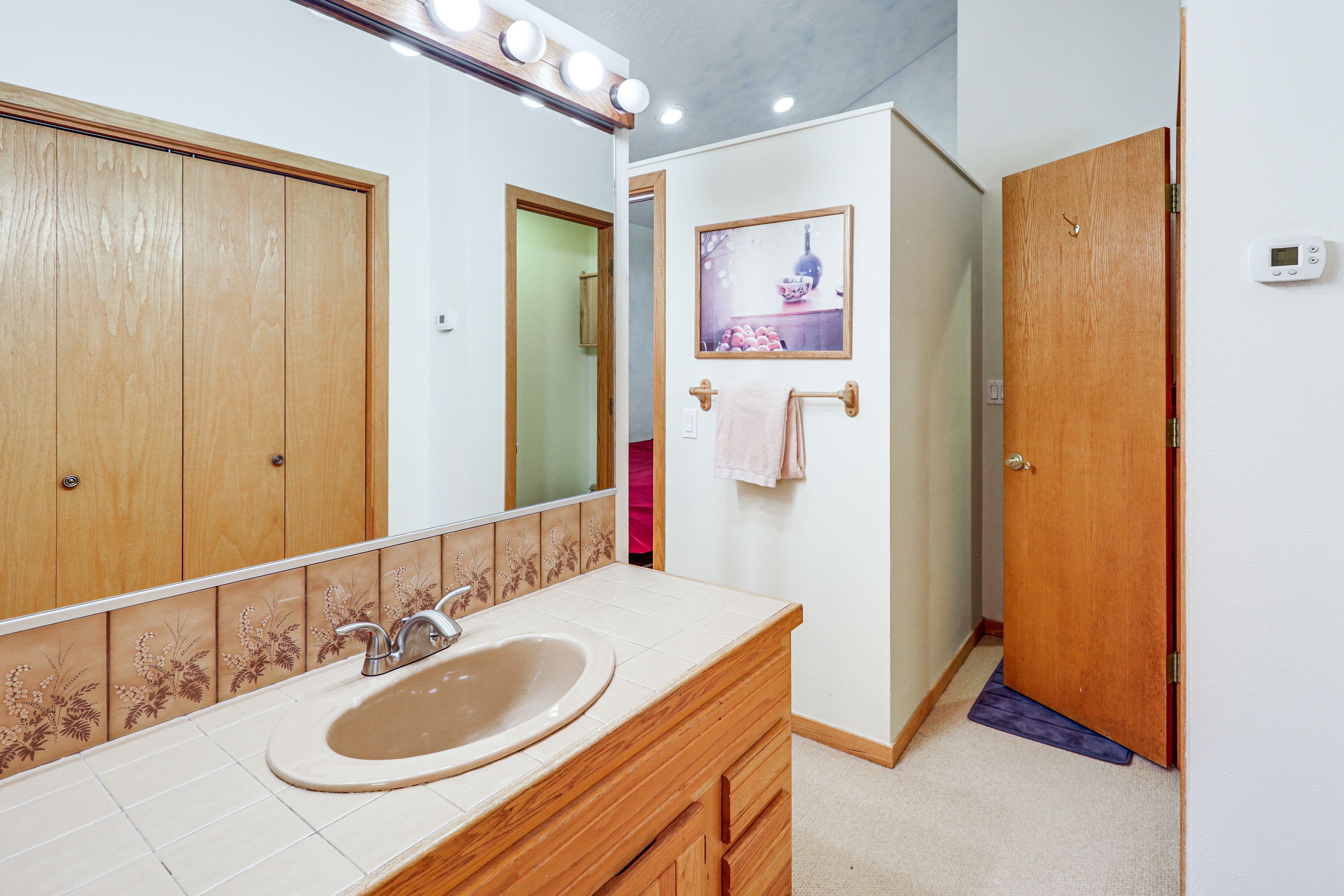 En-Suite Bathroom | Complimentary Toiletries | Hair Dryer | Upper Level