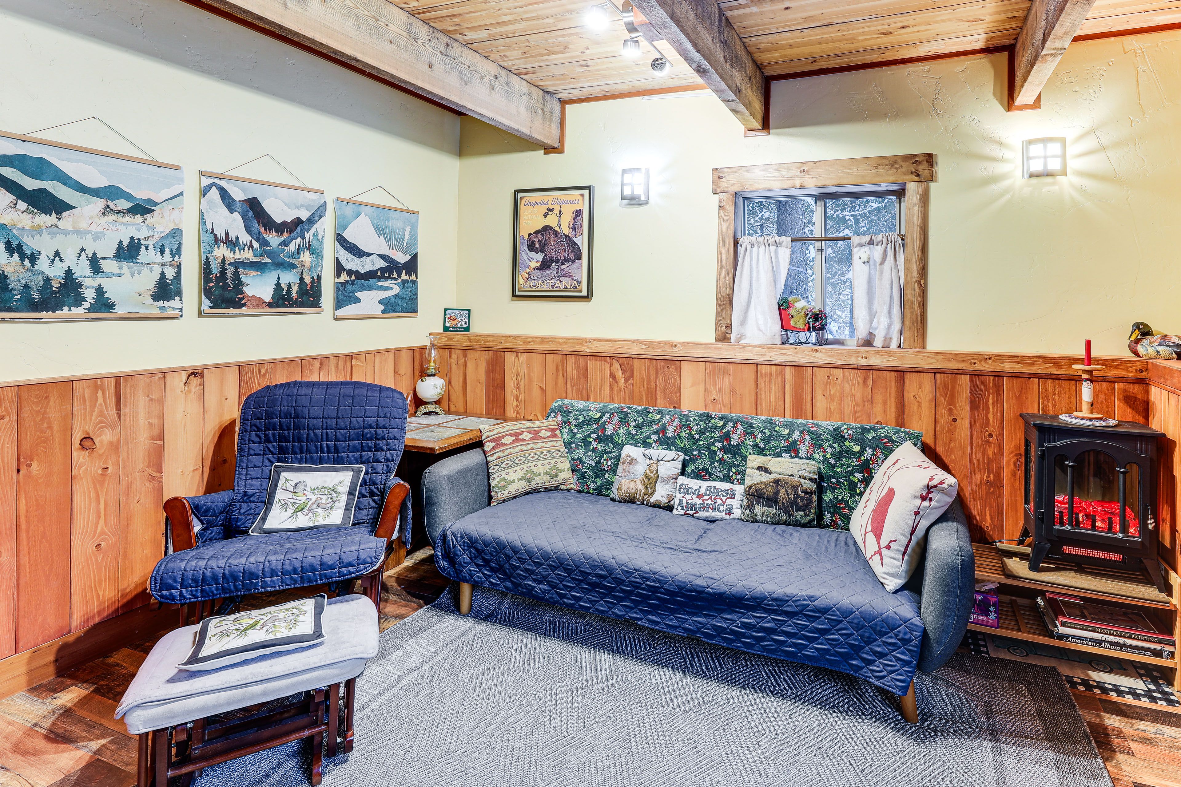 Living Area | Smart TV | Electric Fireplace | Books