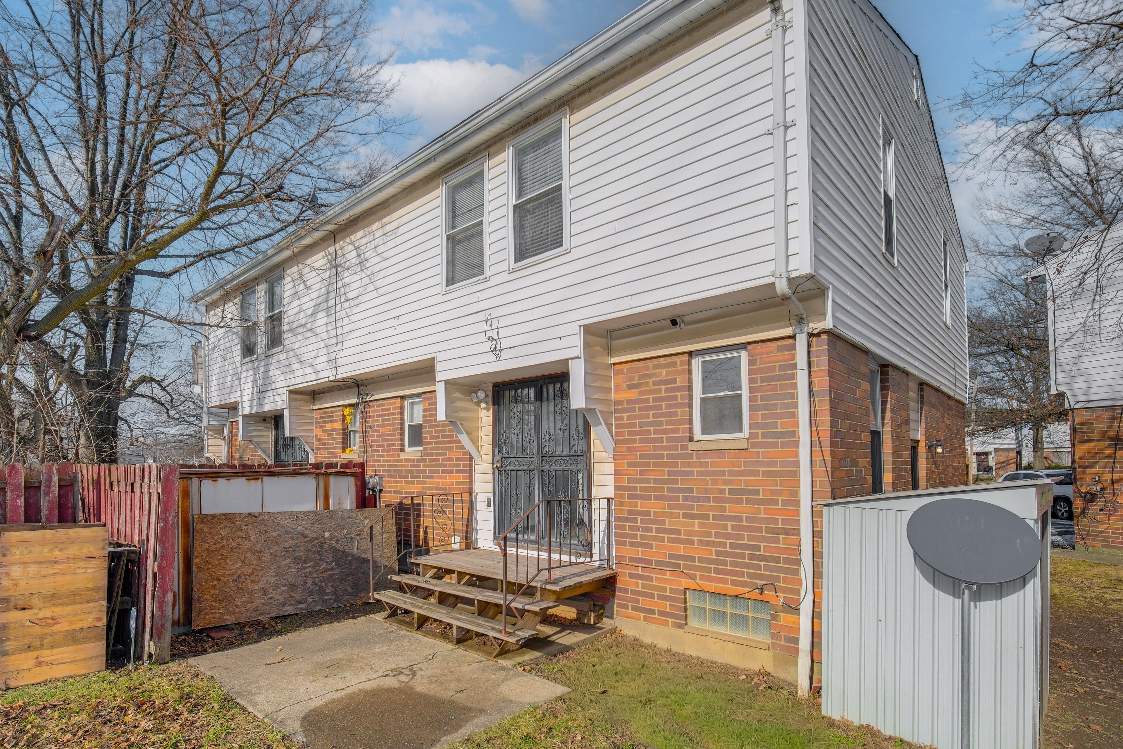Townhome Exterior | Patio | Fenced Yard