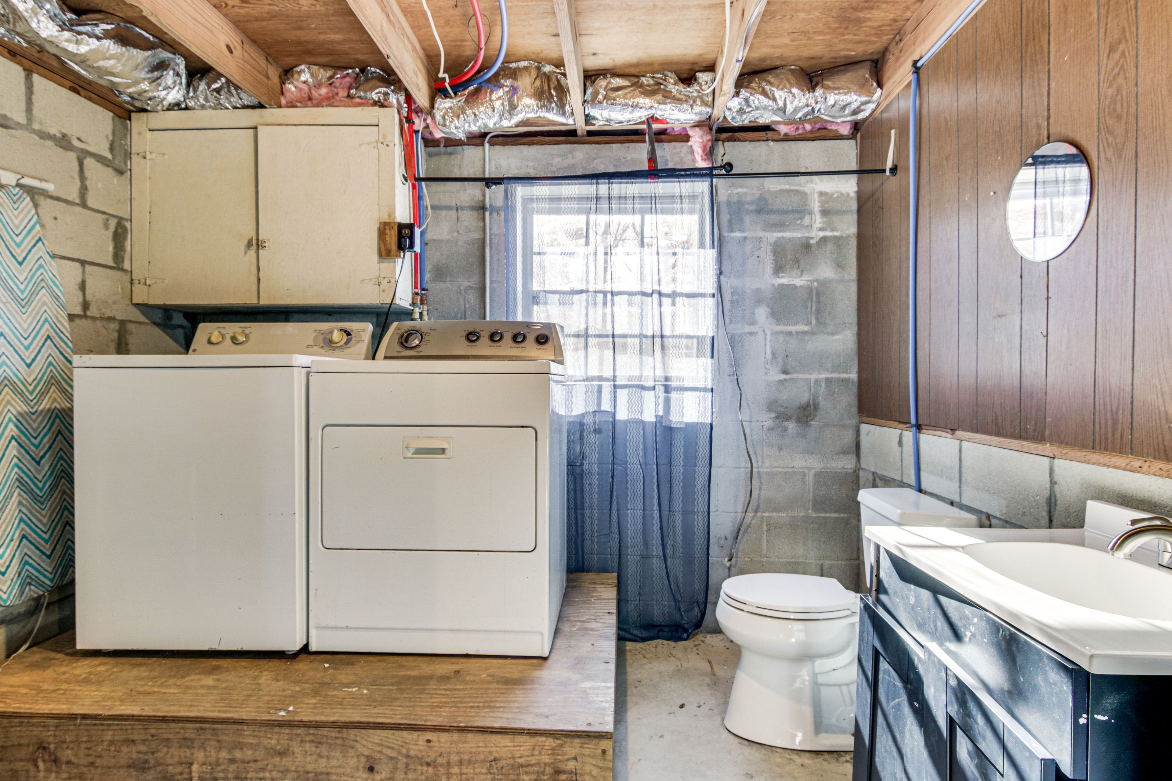 Half Bathroom | Laundry | Lower Floor