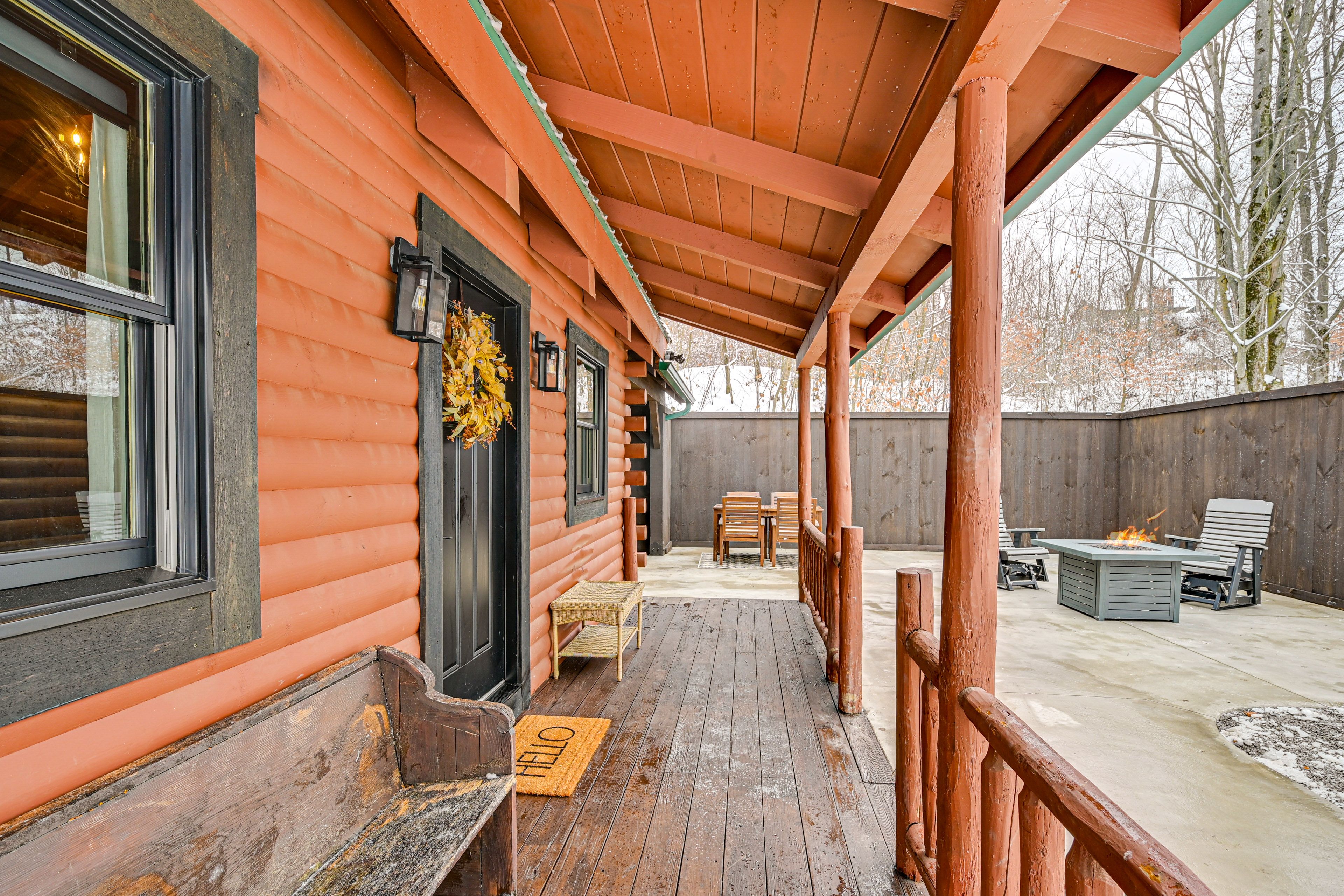Cabin Exterior | Covered Porch w/ Seating | Patio w/ Dining Area | Gas Fire Pit