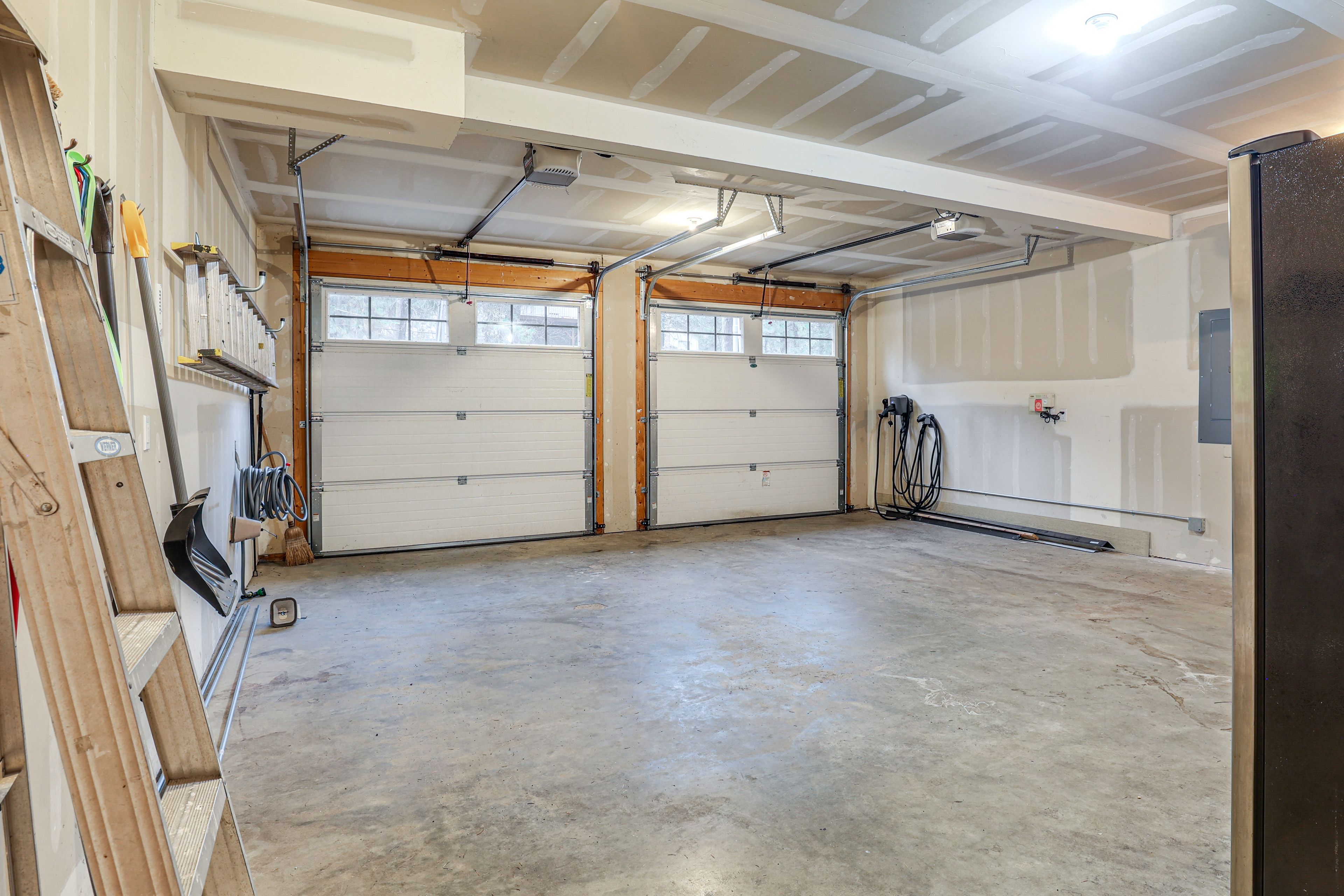 Parking | Garage (2 Vehicles) | 2 EV Chargers | Addt'l Parking (2 Vehicles)