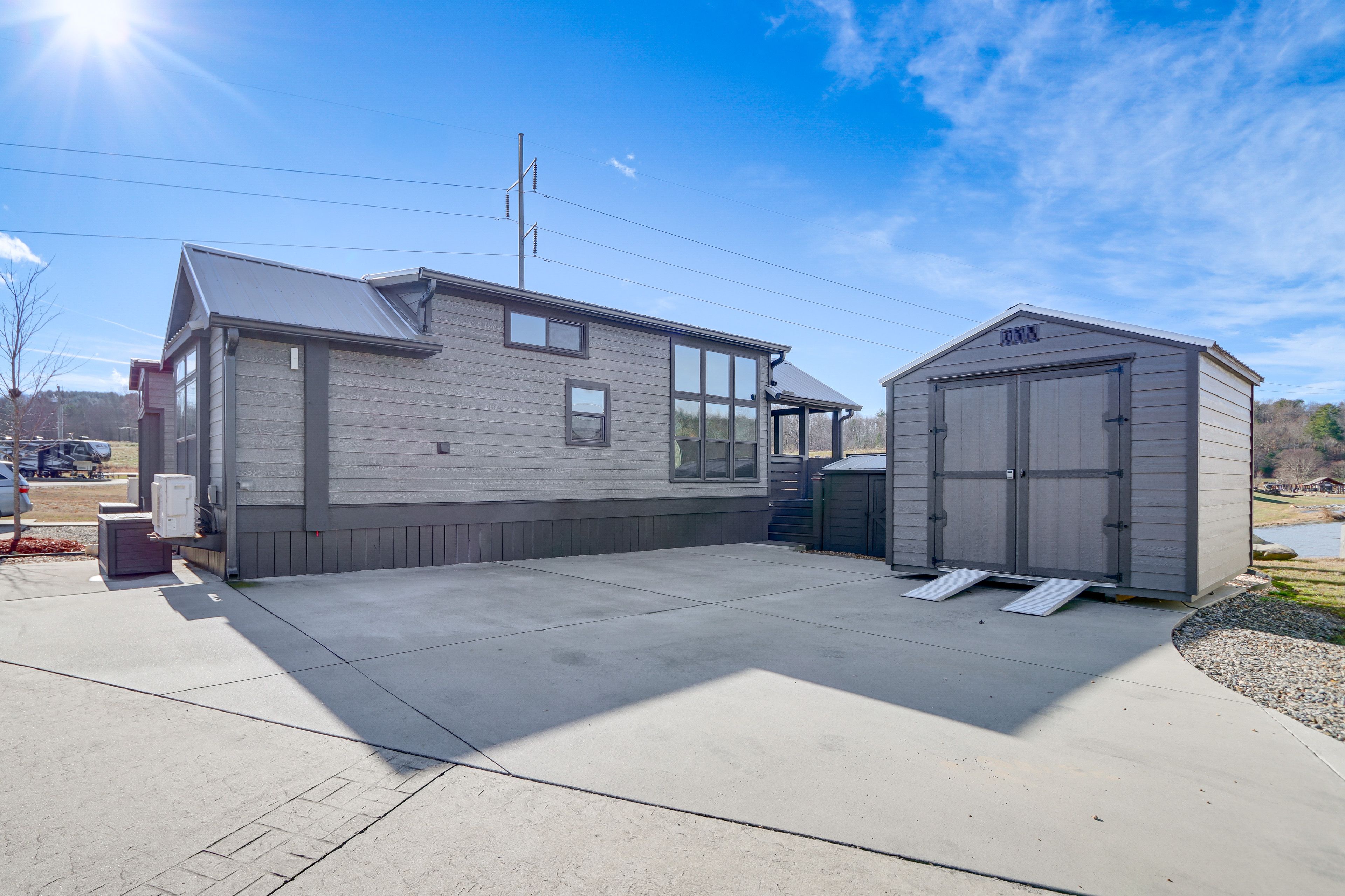 Property Exterior | Driveway (2 Vehicles) | Trailer Parking in Community Lot