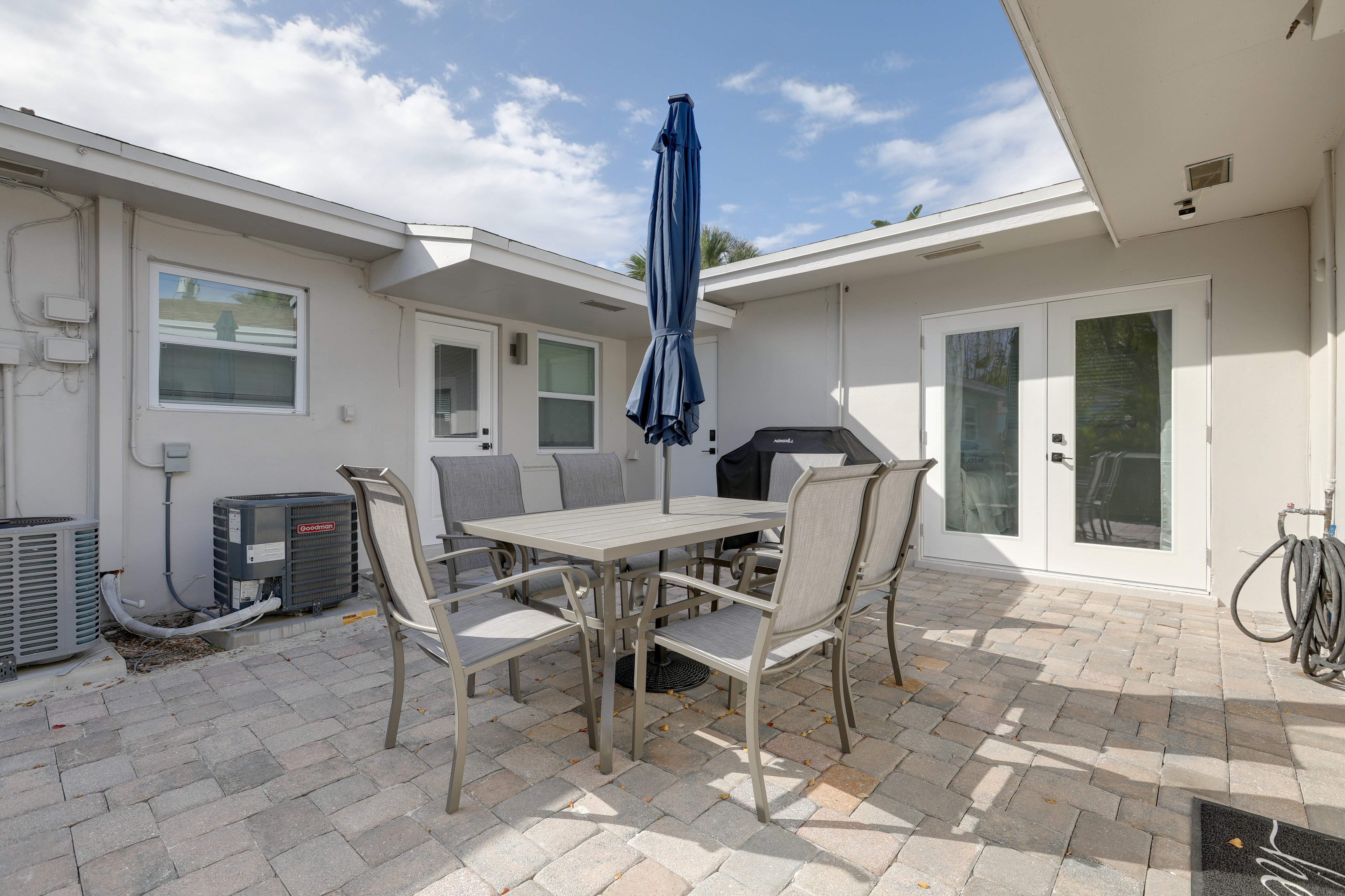 Shared Courtyard | Outdoor Dining Area | Gas Grill