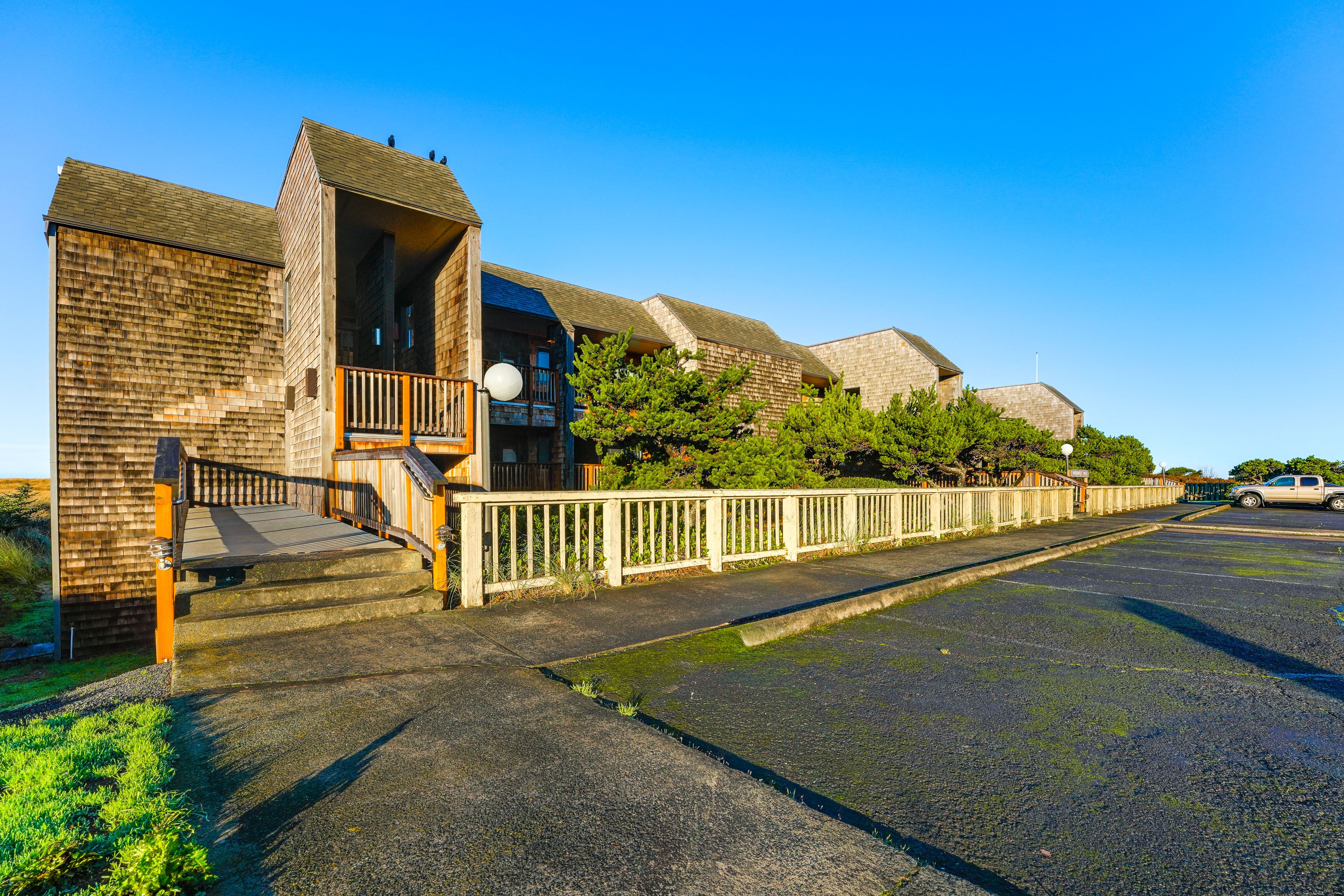 Exterior | Parking | Open Community Lot (First-Come, First-Served)