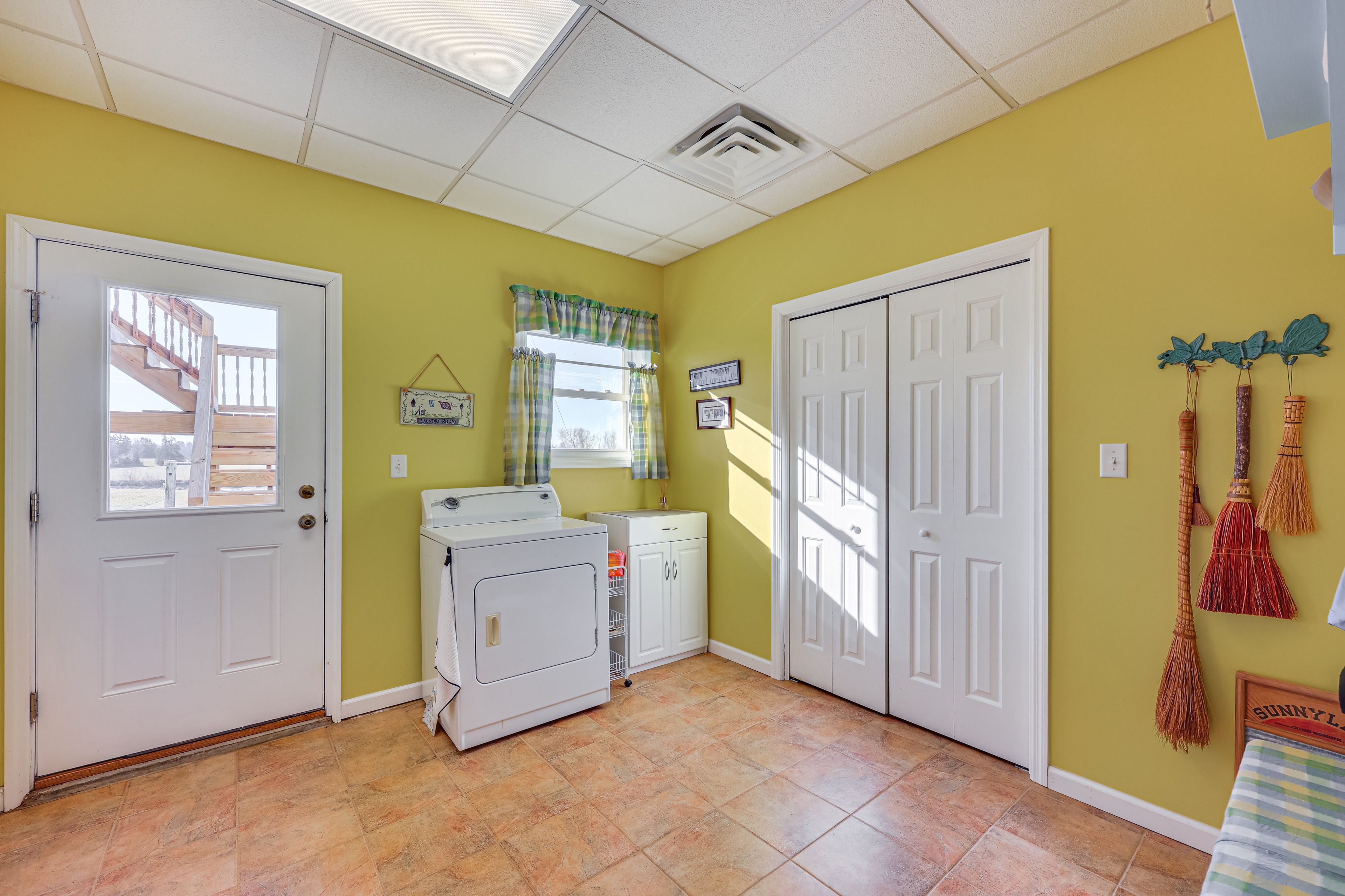 Mudroom | In-Unit Laundry | Detergent | Iron & Board | Ground Floor