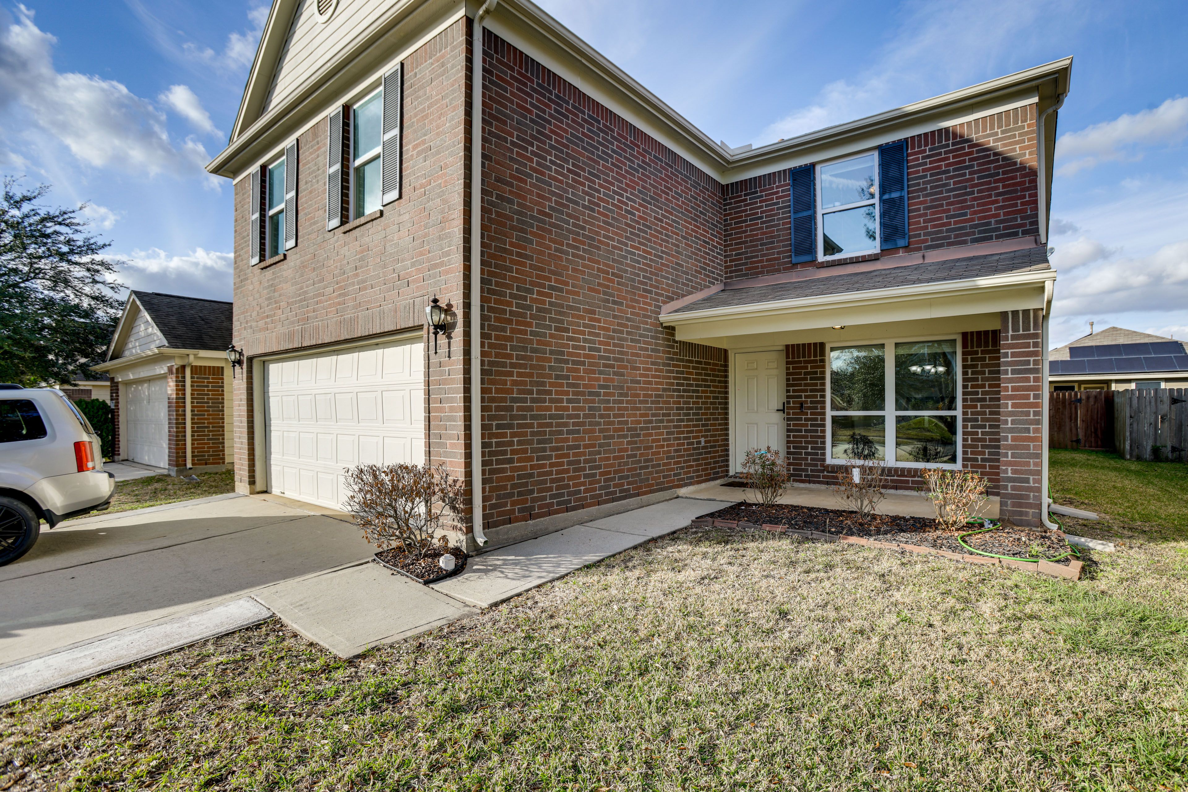 Property Exterior | Garage (2 Vehicles) | Driveway (4 Vehicles)