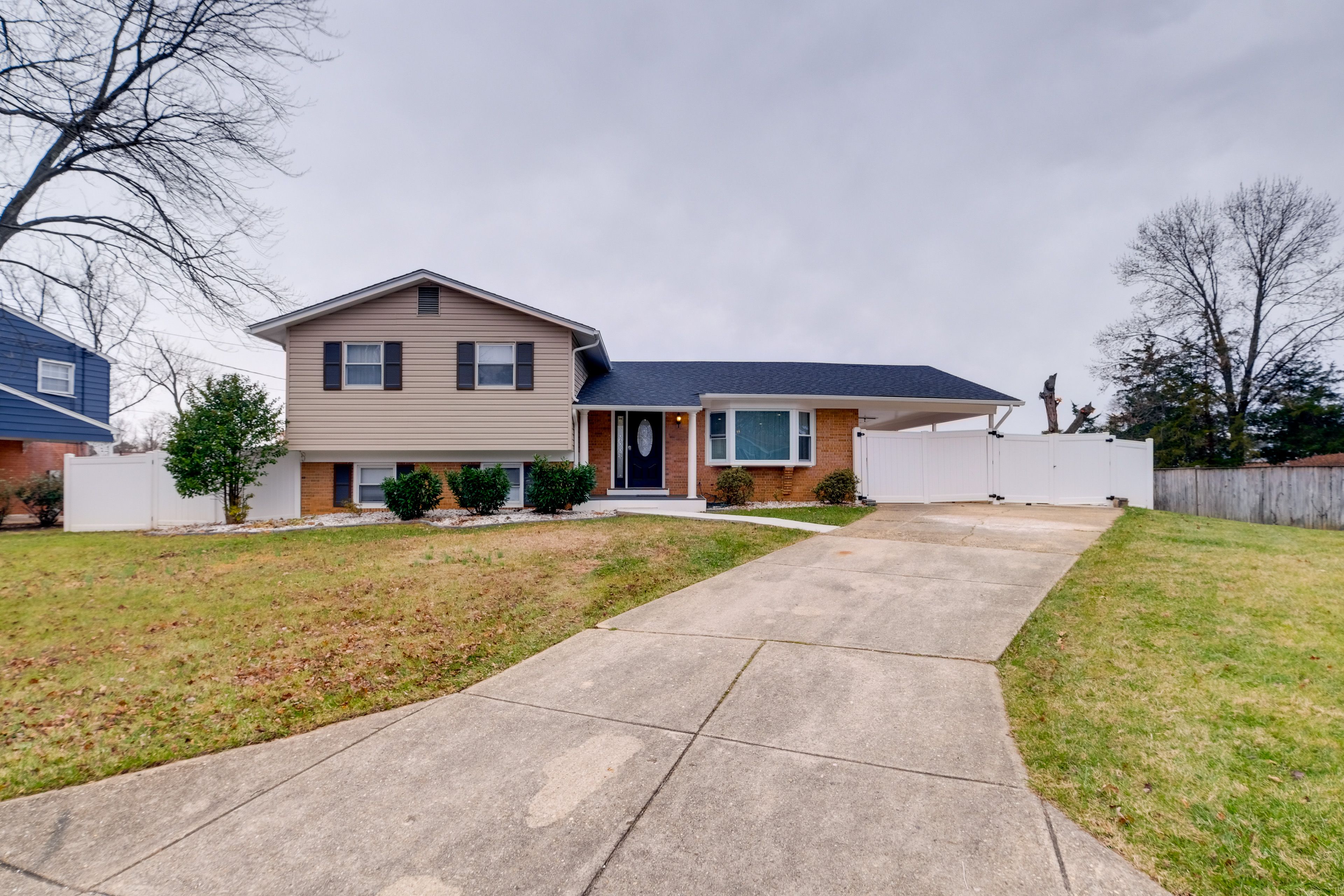 Duplex Exterior | Single-Story Unit | Shared Backyard