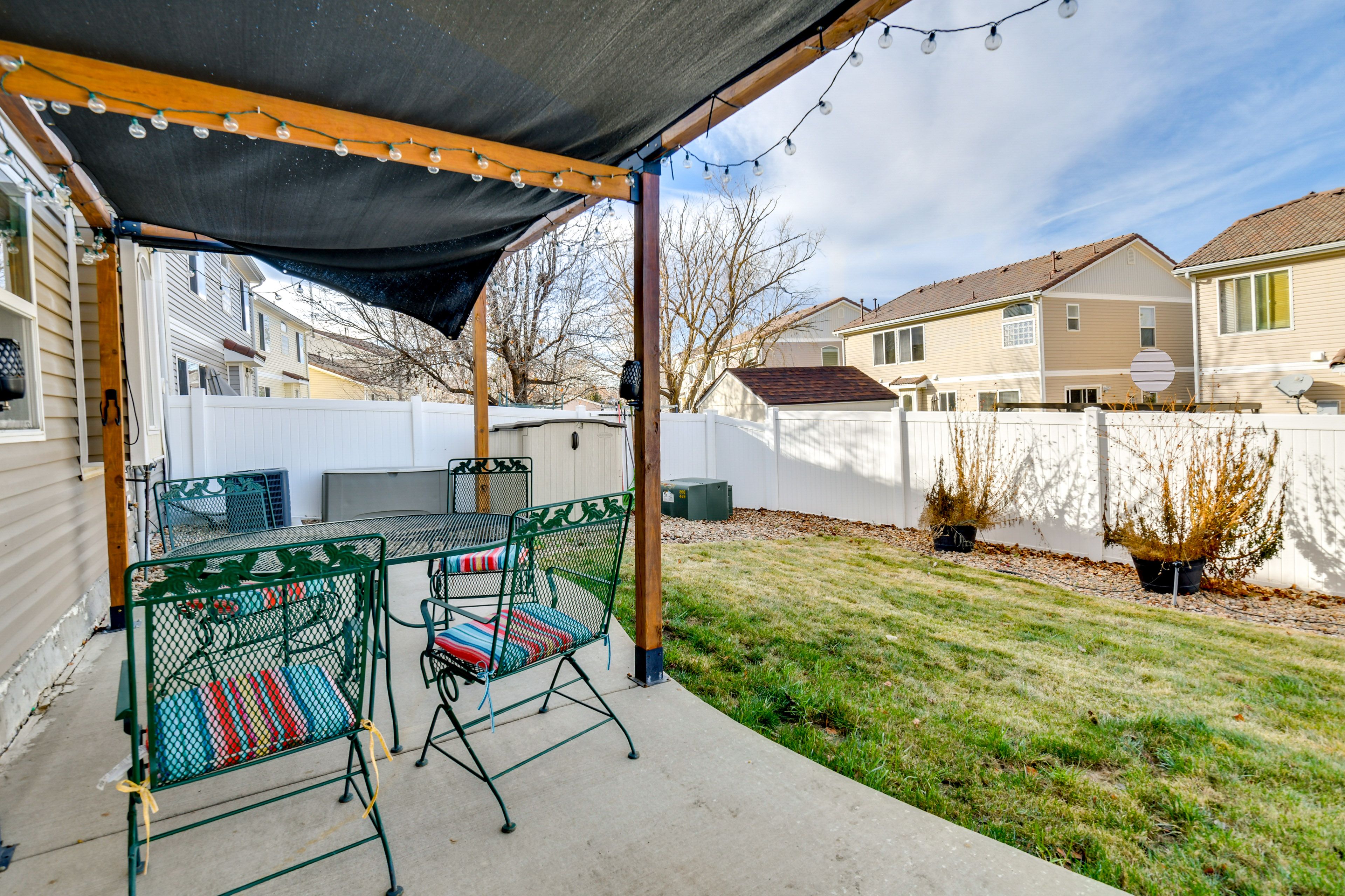 House Exterior | Covered Patio w/ Dining Area