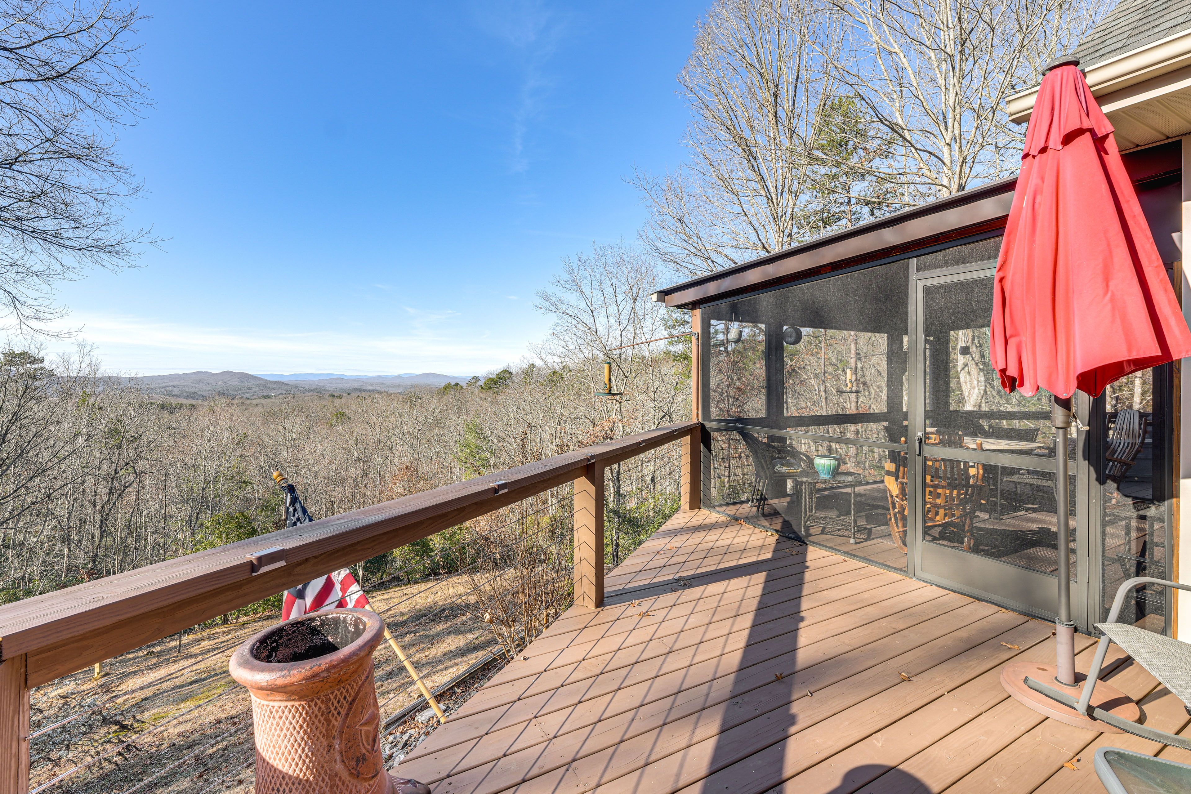 House Exterior | Deck w/ Umbrella & Seating | Chiminea | Mountain Views