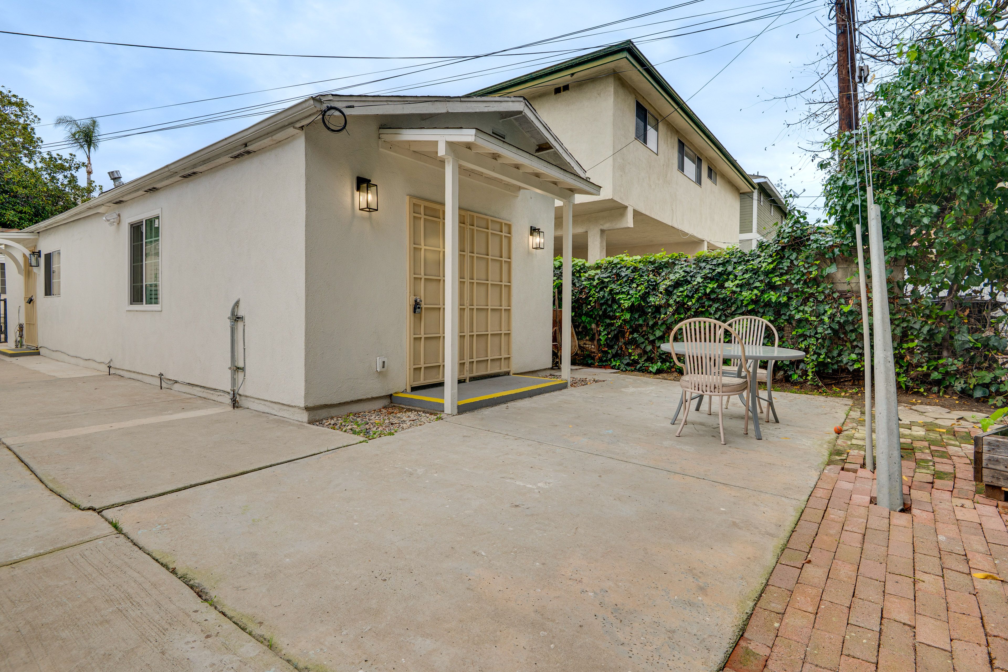 Exterior | Shared Backyard & Patio | 5 Mi to Santa Monica Pier